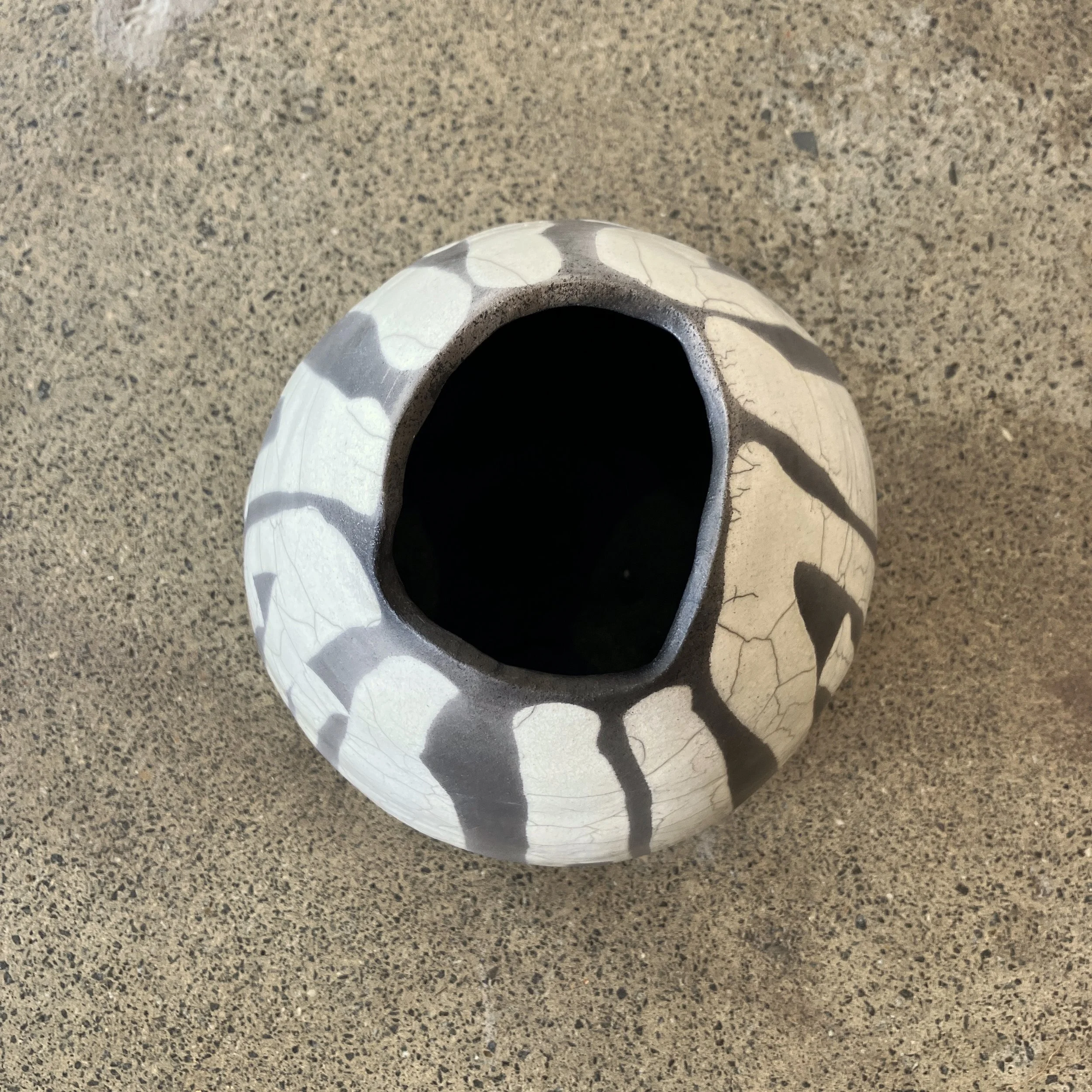 Sarah Larrett_Safari II #6_Glazed Raku_19cm wide x 21cm high_$300_Top.jpg