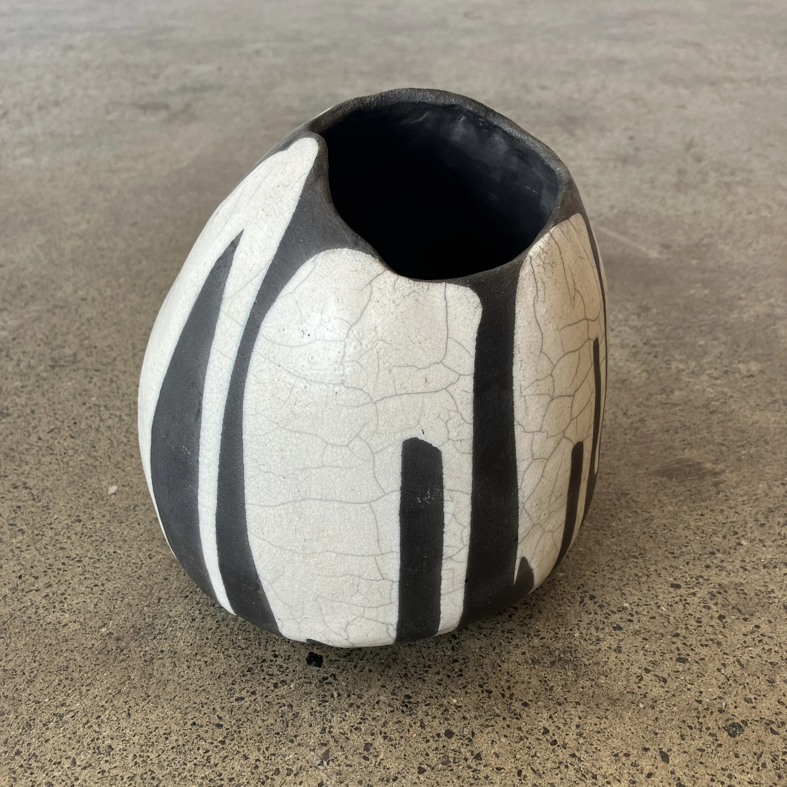 Sarah Larrett_Safari II #8_Glazed Raku_18cm wide x 19cm high_$320_Front 1.jpg