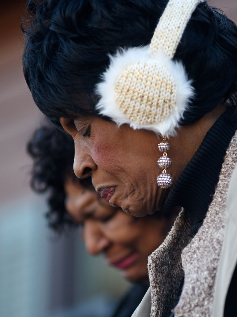  Columbia NAACP president Mary Ratliff, front, and Rev. Myra Drummond-Lewis bow their heads to pray during a Martin Luther King Jr. 50th year memorial service Wednesday at the J.W. "Blind" Boone Home gardens in Columbia. Ratliff led the service, whic