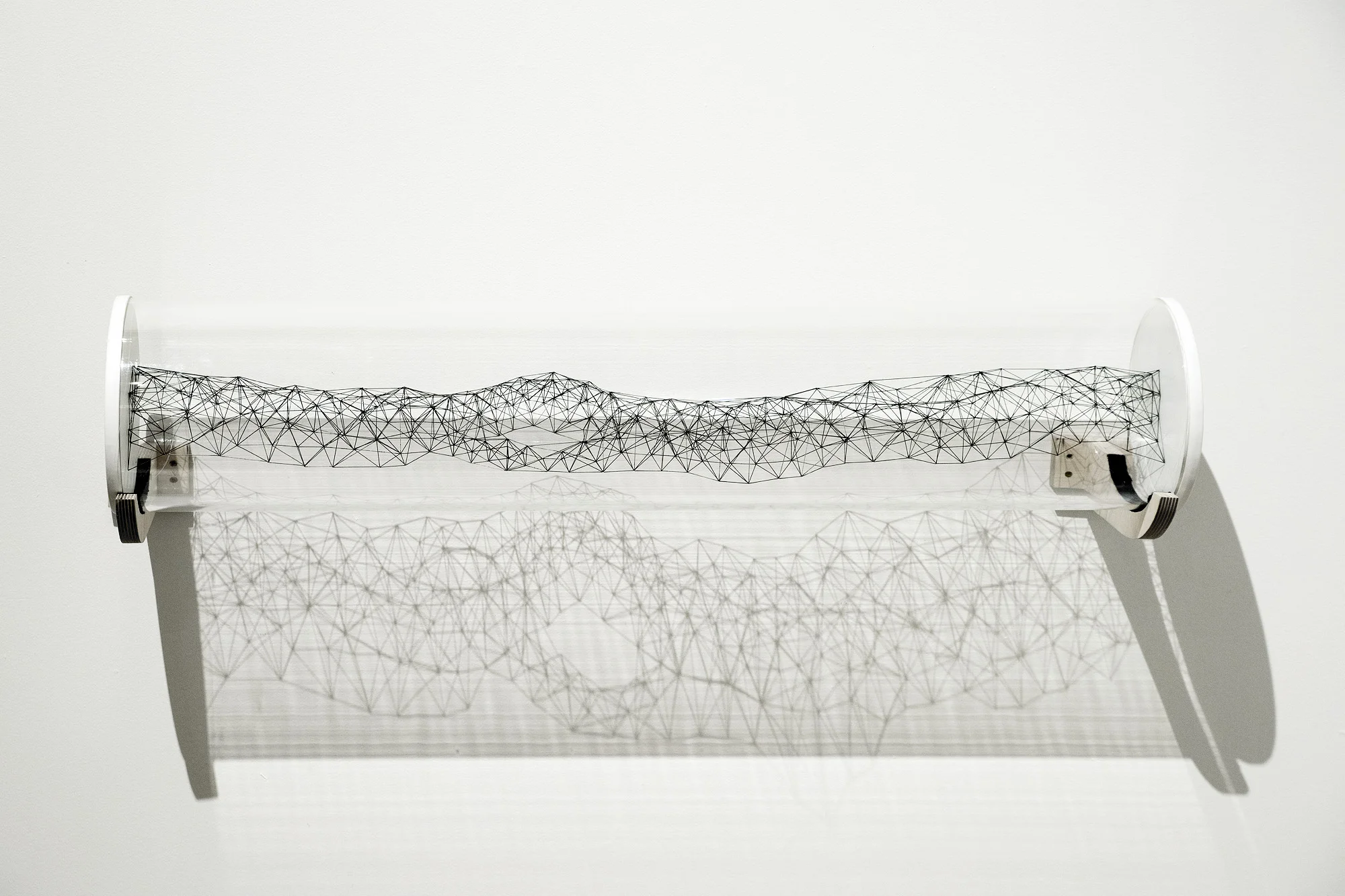 PETER TREVELYAN, flow #3, 2018 0.5 mm graphite pencil leads, acrylic tube Courtesy of Bartley + Company Art