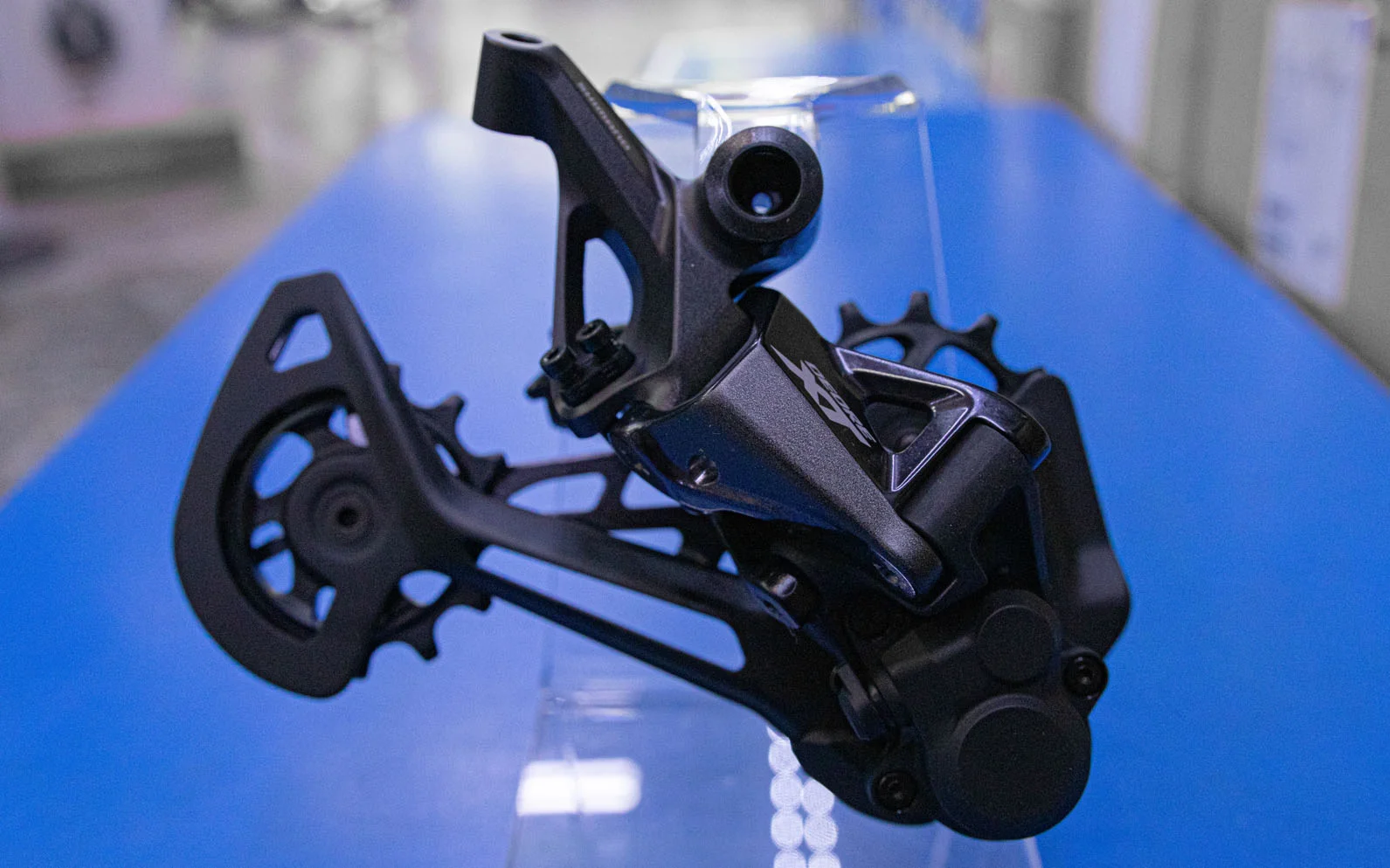 Rear Derailleur Shimano’s new 12speed XT & SLX has received the total make-up treatment from their Big Brother’s the M9100 XTR. Pulley wheels are now up to 13T with the XT’s rolling on ball bearings. Both the XT and SLX will come with integrated clutches allowing for reduced chain slap.