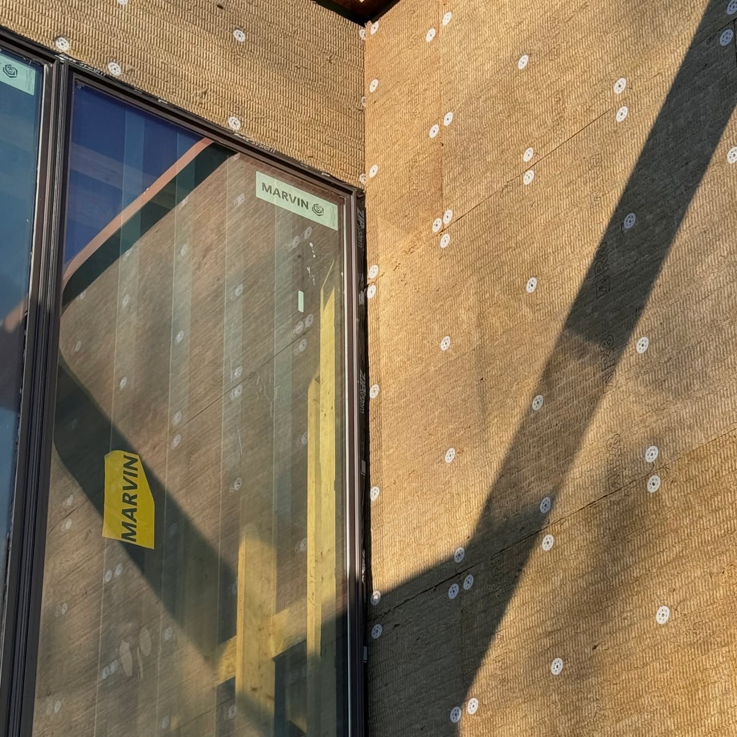Building codes are pushing us. 

Nearly all the new homes we&rsquo;re building are integrating exterior insulation to reduce thermal bridging, sound transfer, and improve energy consumption. For this application, our go to is 2&rdquo; comfortboard as