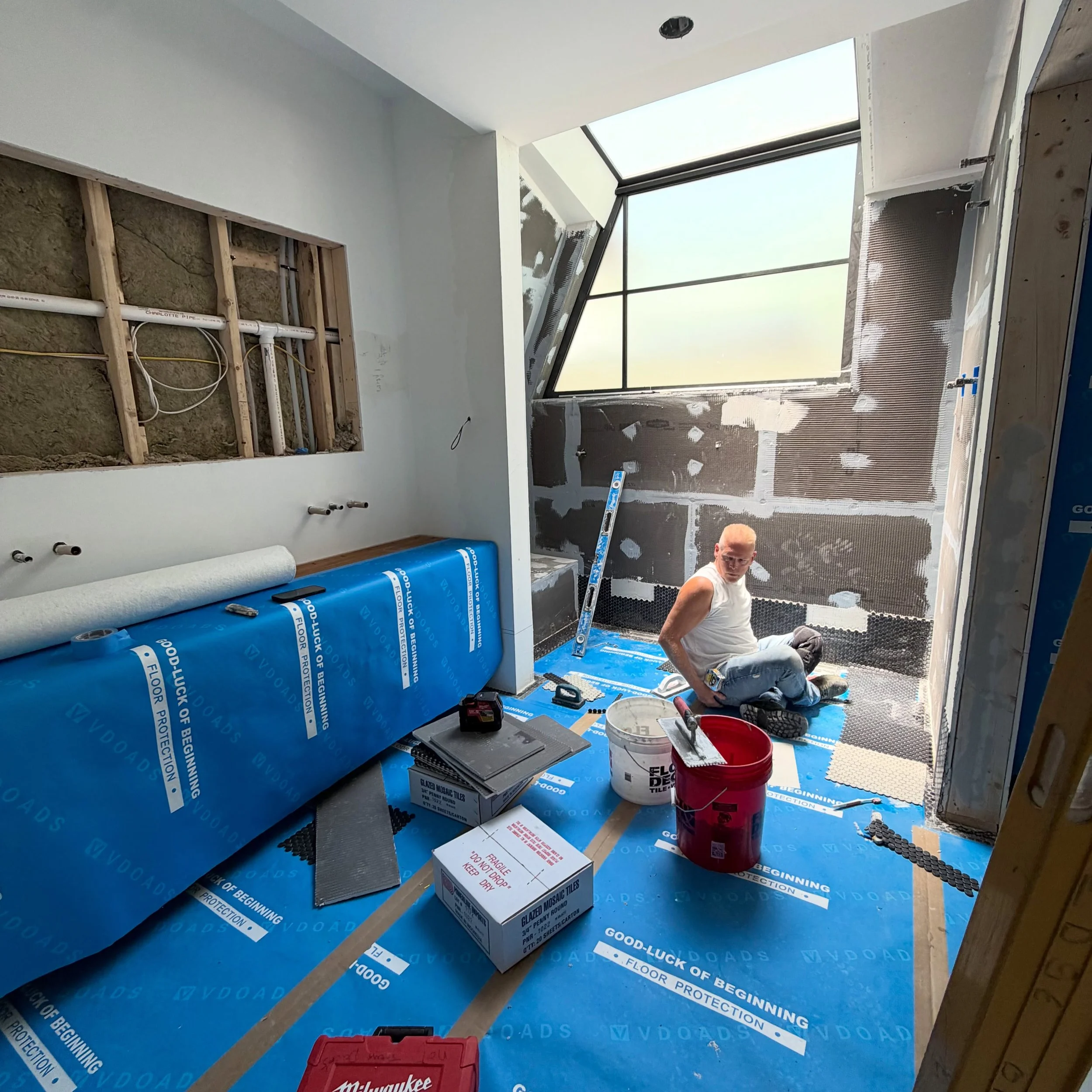 How much badassery can you fit in one bathroom? 

It&rsquo;s hard to pinpoint what&rsquo;s stealing the show here. You have the Arcadia unit, that without traditional framing between mulls seamlessly transitions to a skylight in the master shower. Th