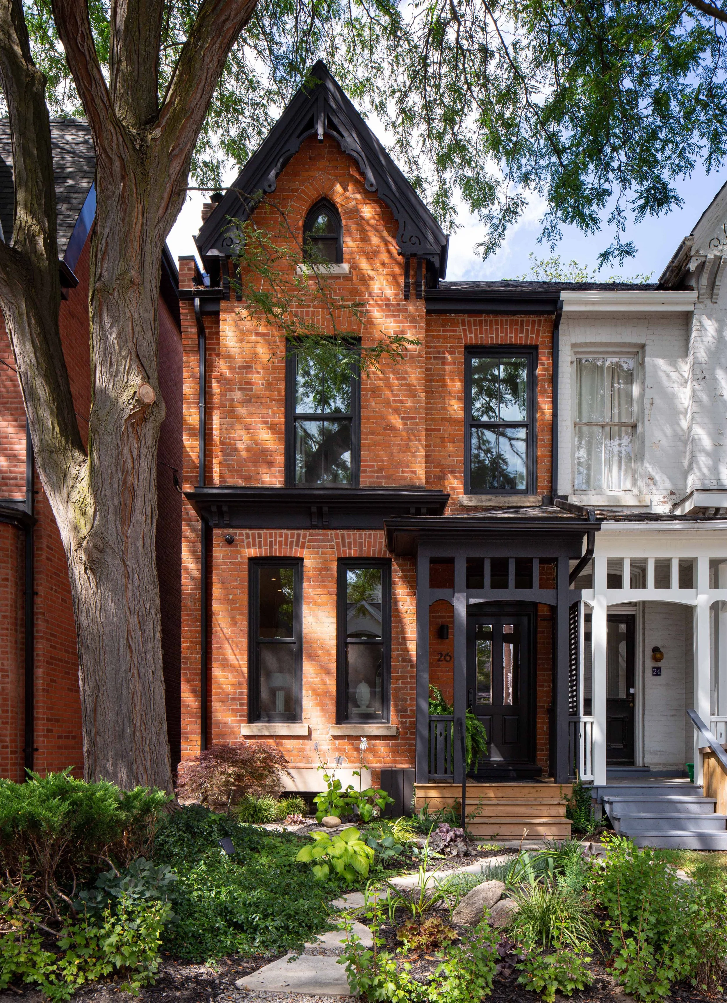 Restored Victorian brick facade renovation in Yorkville Toronto by Wayback Architects