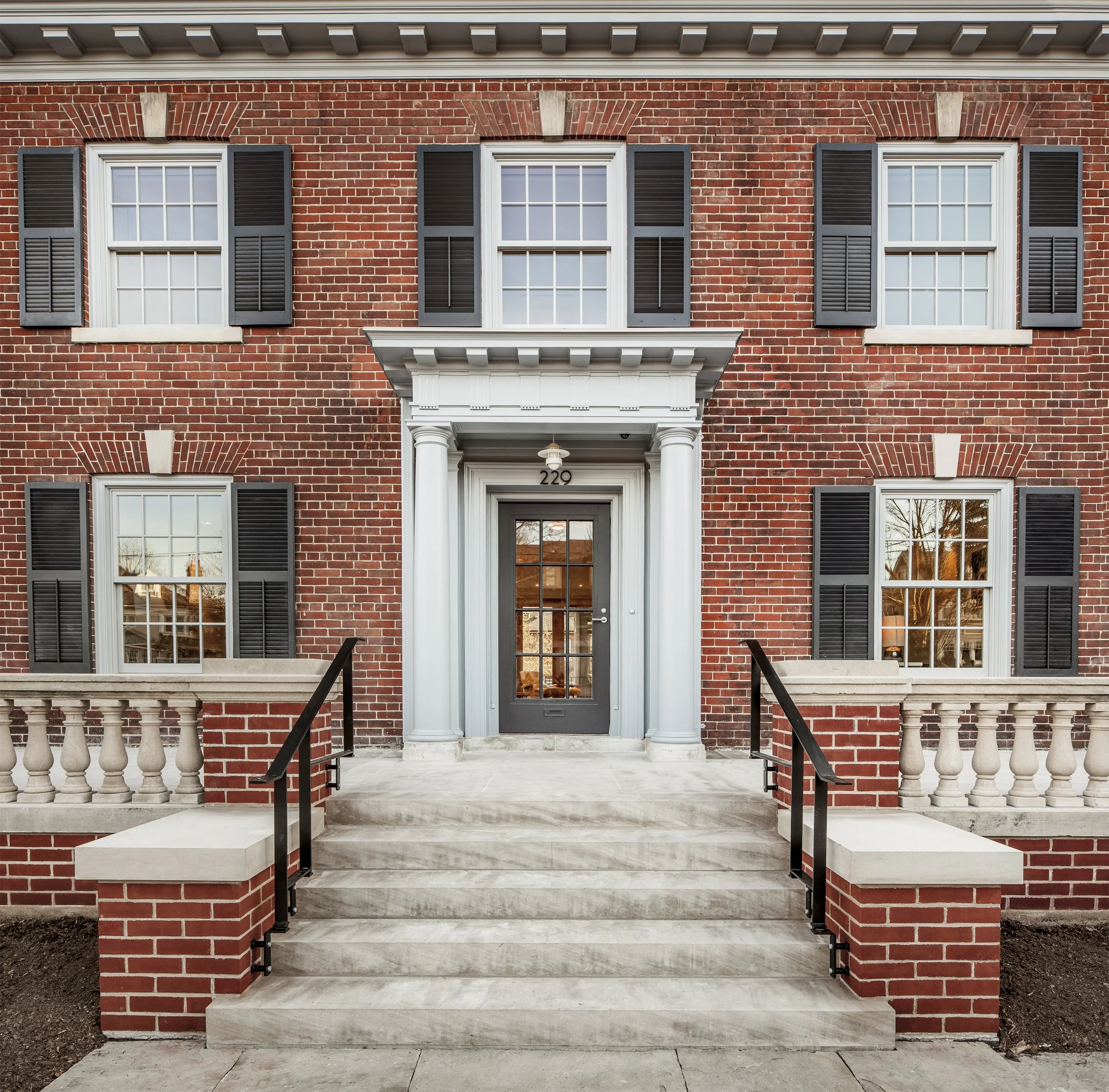 Reconstructed C-listed historic brick house facade renovation in Rosedale Toronto combining heritage preservation with contemporary architecture by Wayback Architects