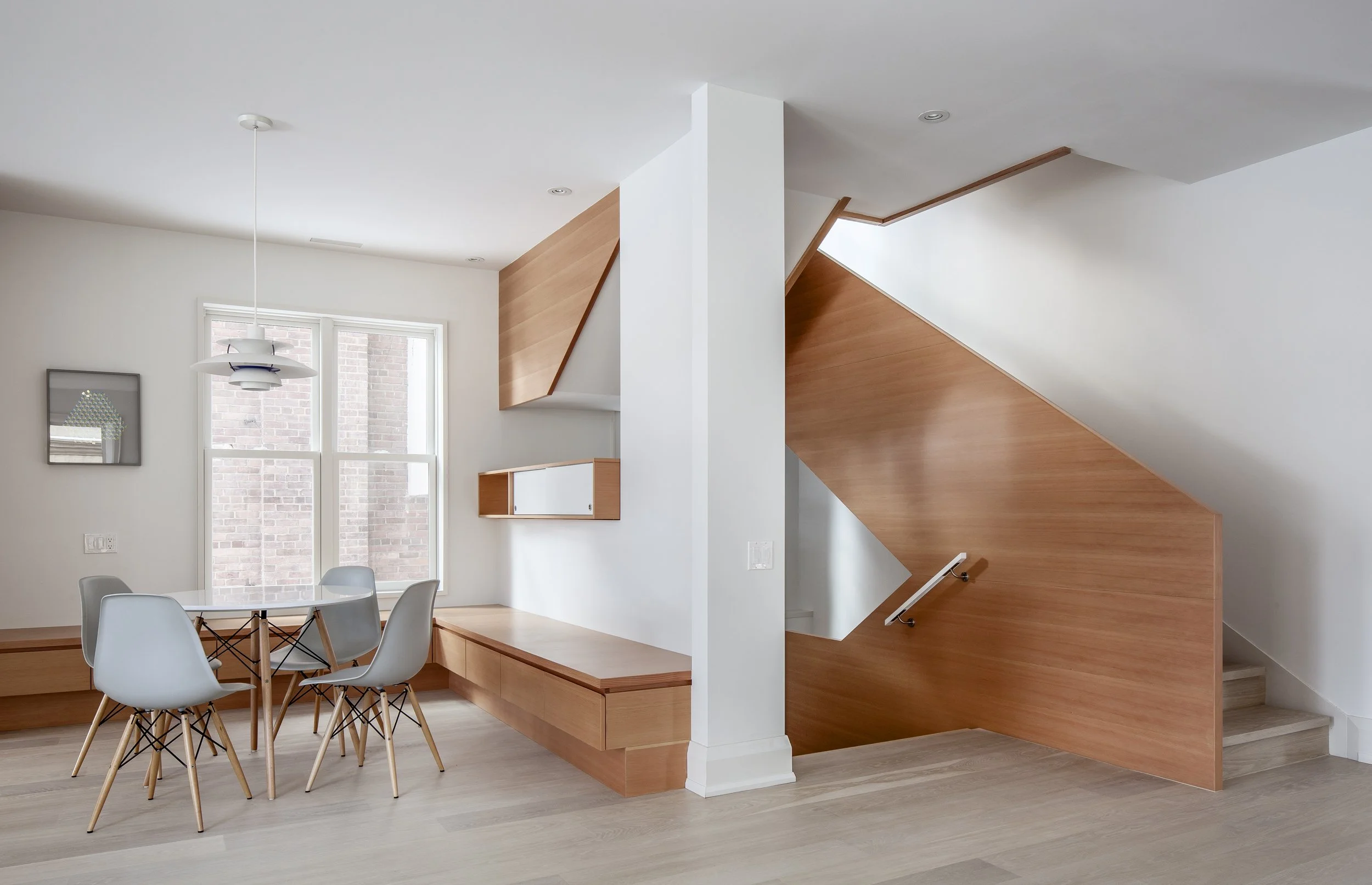 Sculptural multi-level floating staircase made of custom Douglas fir connecting four storeys in a modern Rosedale home renovation by Wayback Architects.