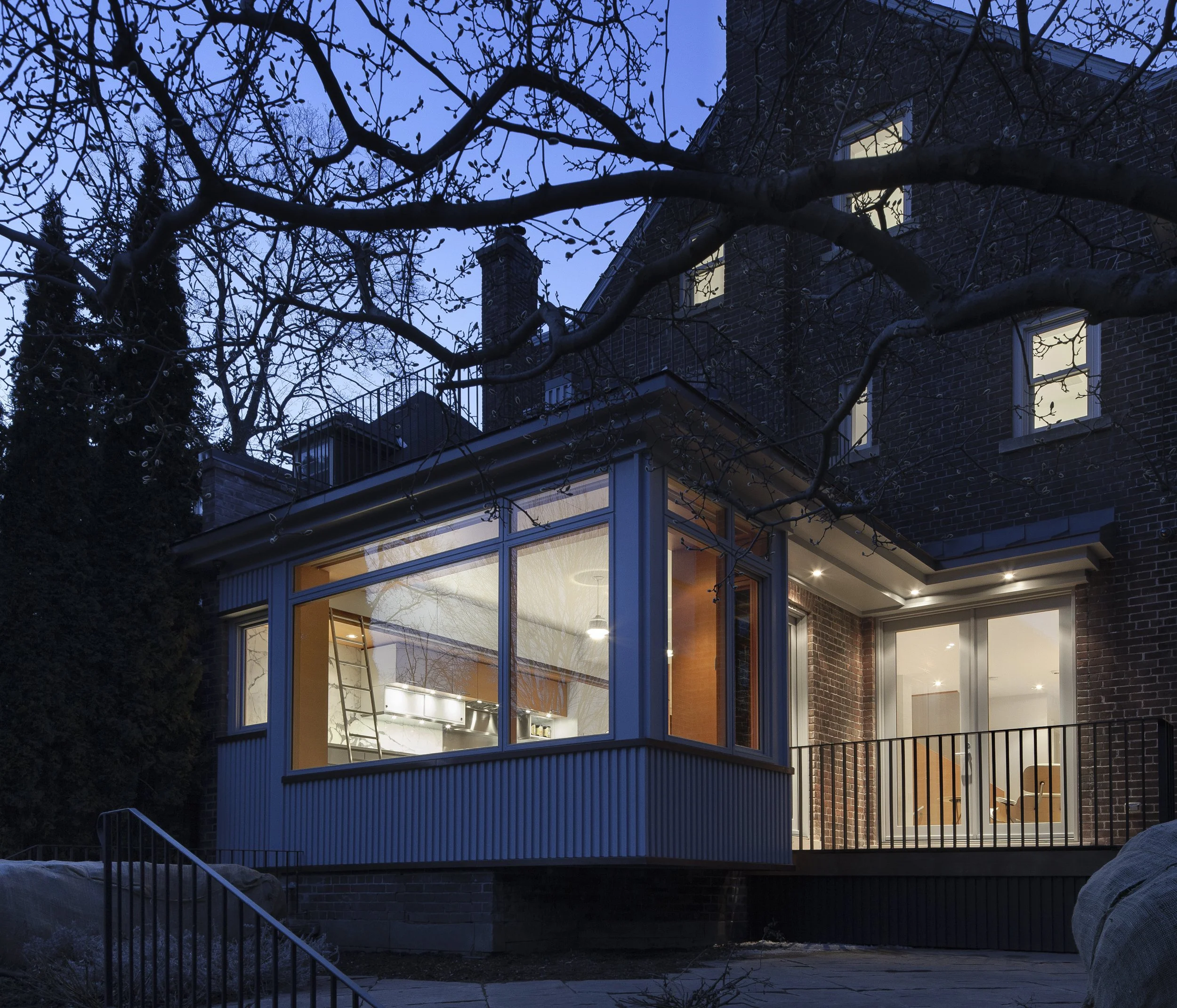 Contextual modern addition to a C-listed heritage house in Rosedale, Toronto, designed by residential architects Wayback Architects