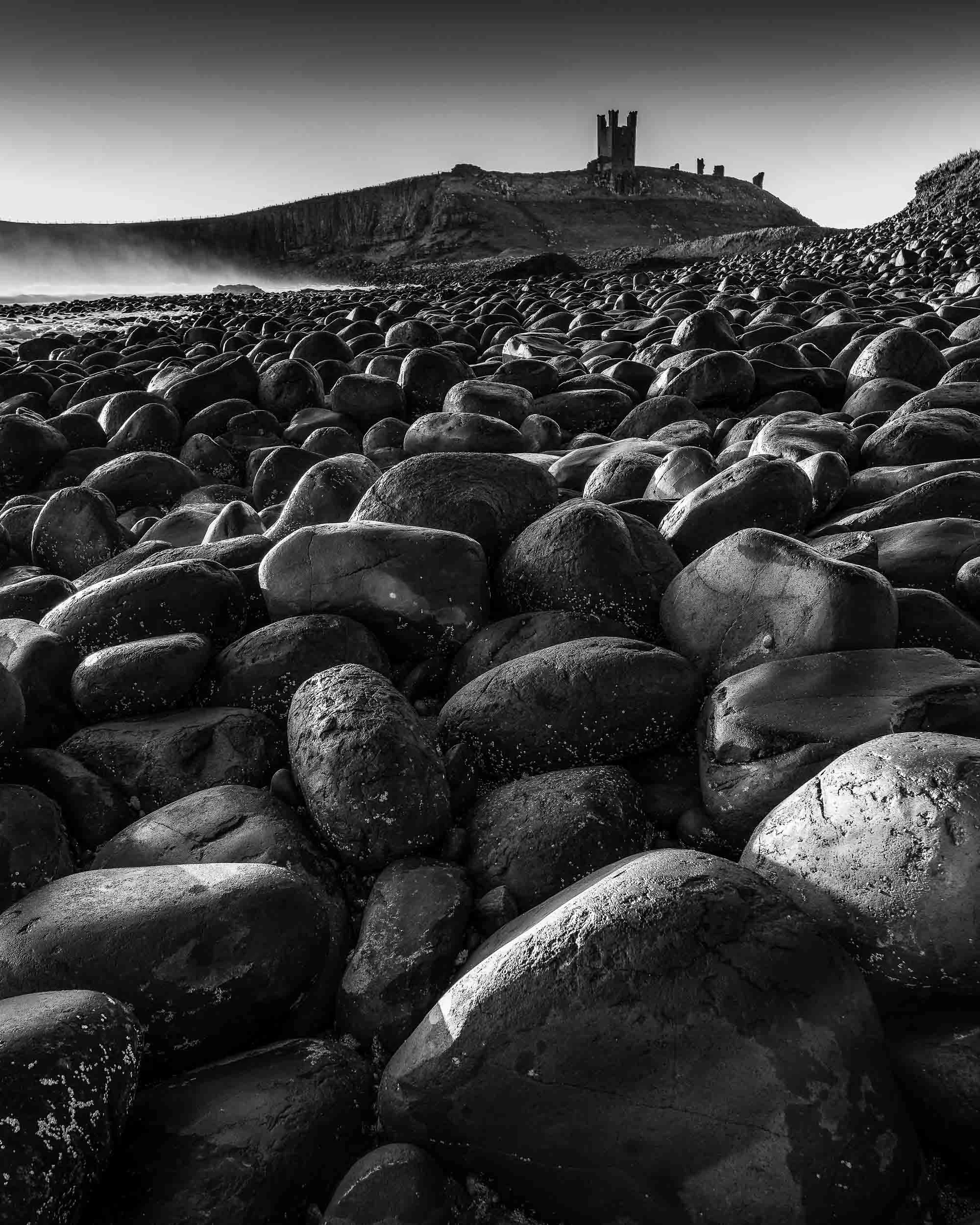 Dunstanburgh Castle and boulders
