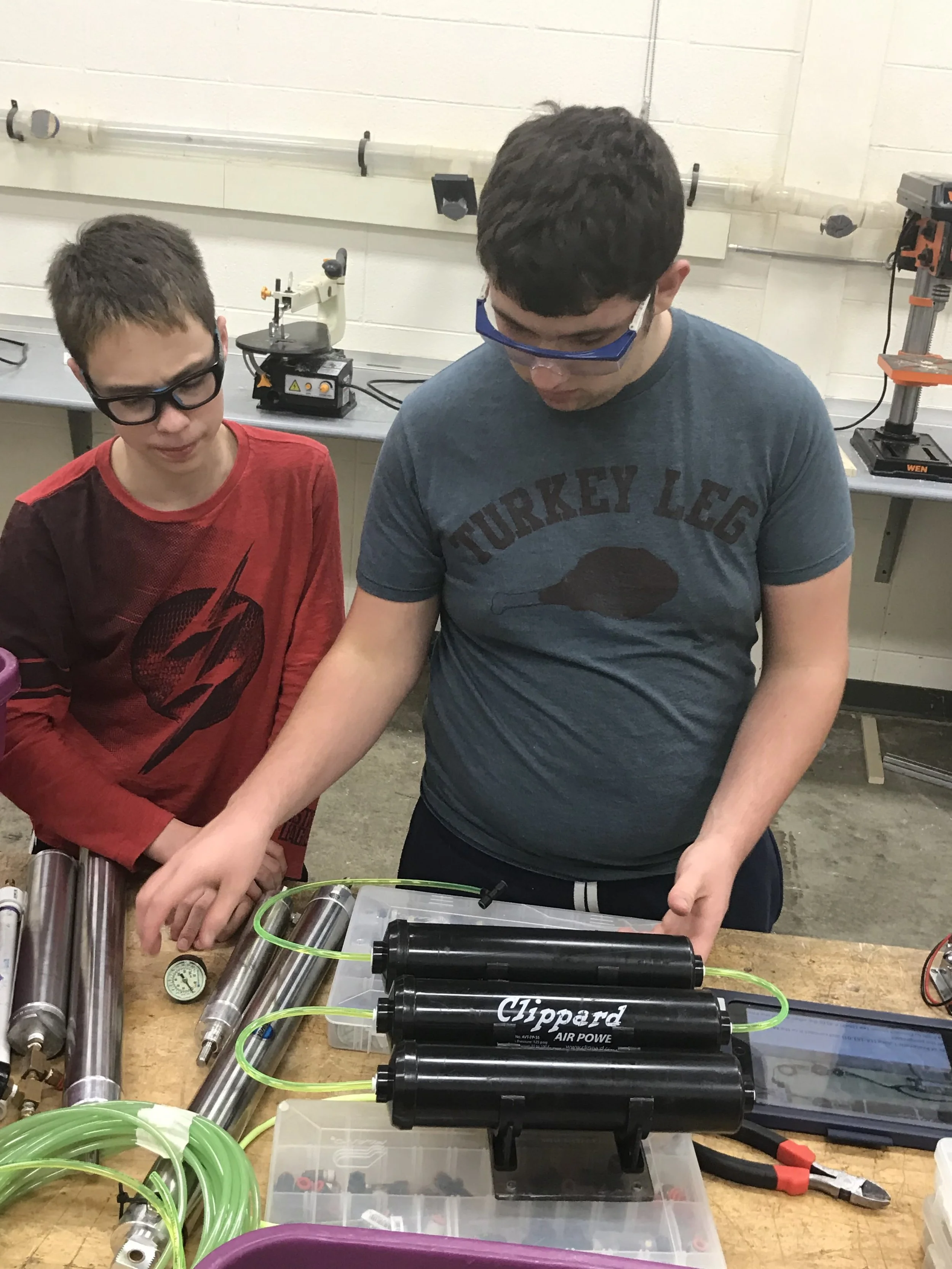 Working on the pneumatic cannon designed for entertainment