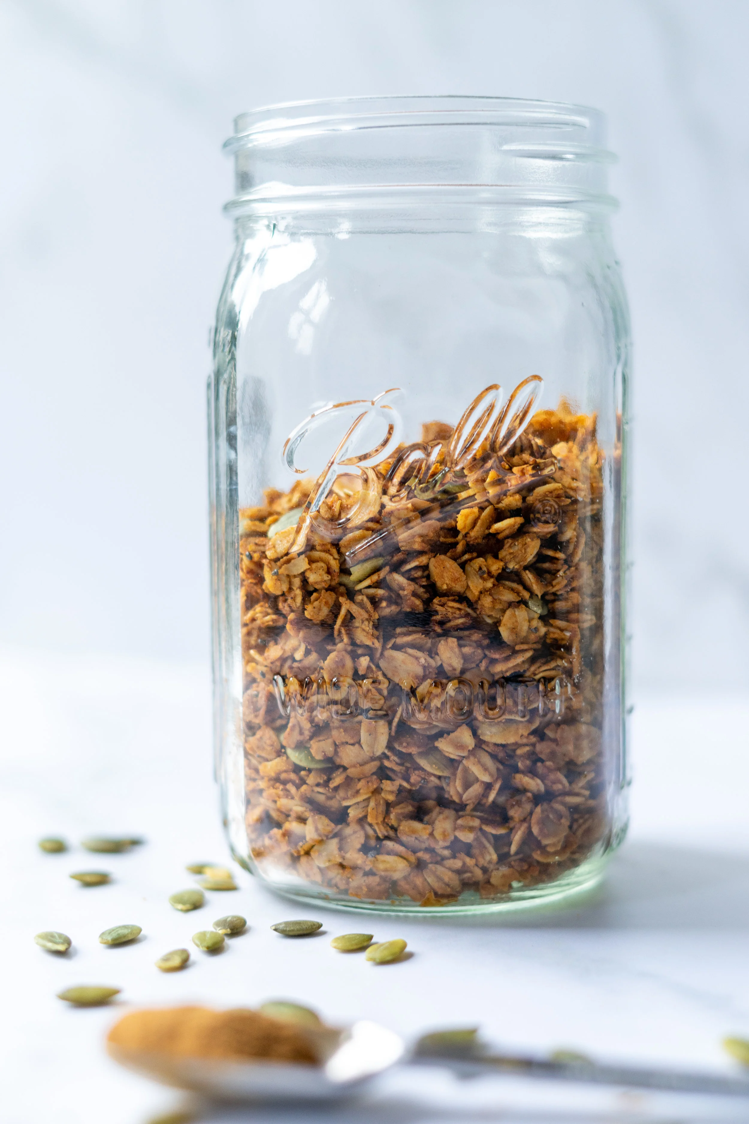 pumpkin spice granola, pumpkin spice recipe, vegan pumpkin spice recipe, vegan pumpkin spice, how to make your own granola, vegan granola recipe, vegan pumpkin spice granola, easy granola recipe, easy vegan granola recipe, pumpkin butter, recipe using pumpkin butter, is pumpkin butter vegan, how to use pumpkin butter, ways to use pumpkin butter, how to use chia seeds, ways to use chia seeds, pumpkin seeds, recipe using pumpkin seeds, pumpkin pie spice, pumpkin spice flavored recipe, vegan i am rorie, i am rorie, i am rorie food blogger, vegan food blogger, vegan chicago food blogger, chicago food blogger, food blogger, homemade granola, homemade granola recipe, granola recipe, rolled oats, brown sugar, coconut oil, healthy granola recipe
