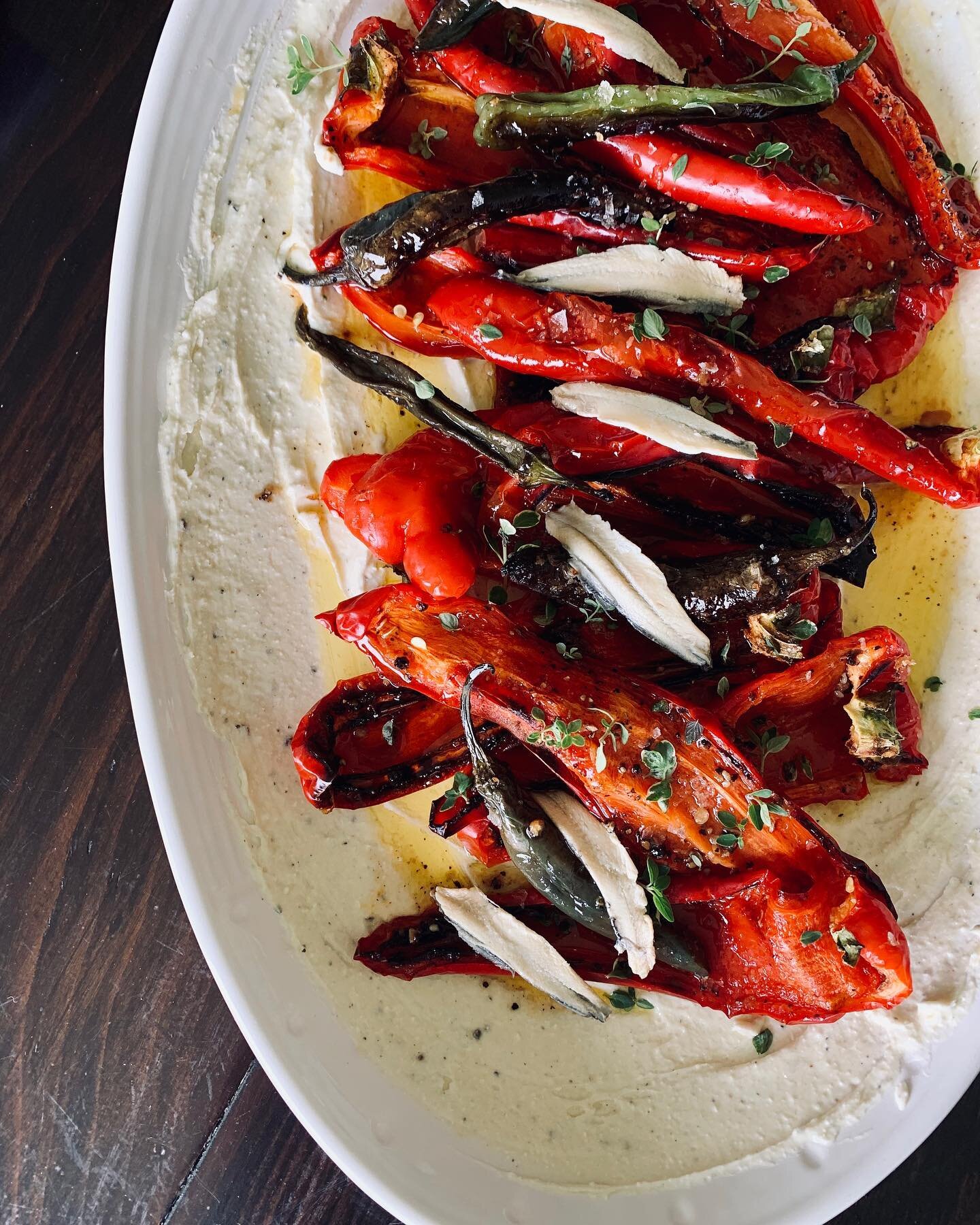 Oooooo this dish. Roasted peppers, whipped feta, white anchovies, tons o&rsquo; olive oil. Simple. So yummy. Beautiful ingredients = beautiful food. ❤️ @thebarnnc