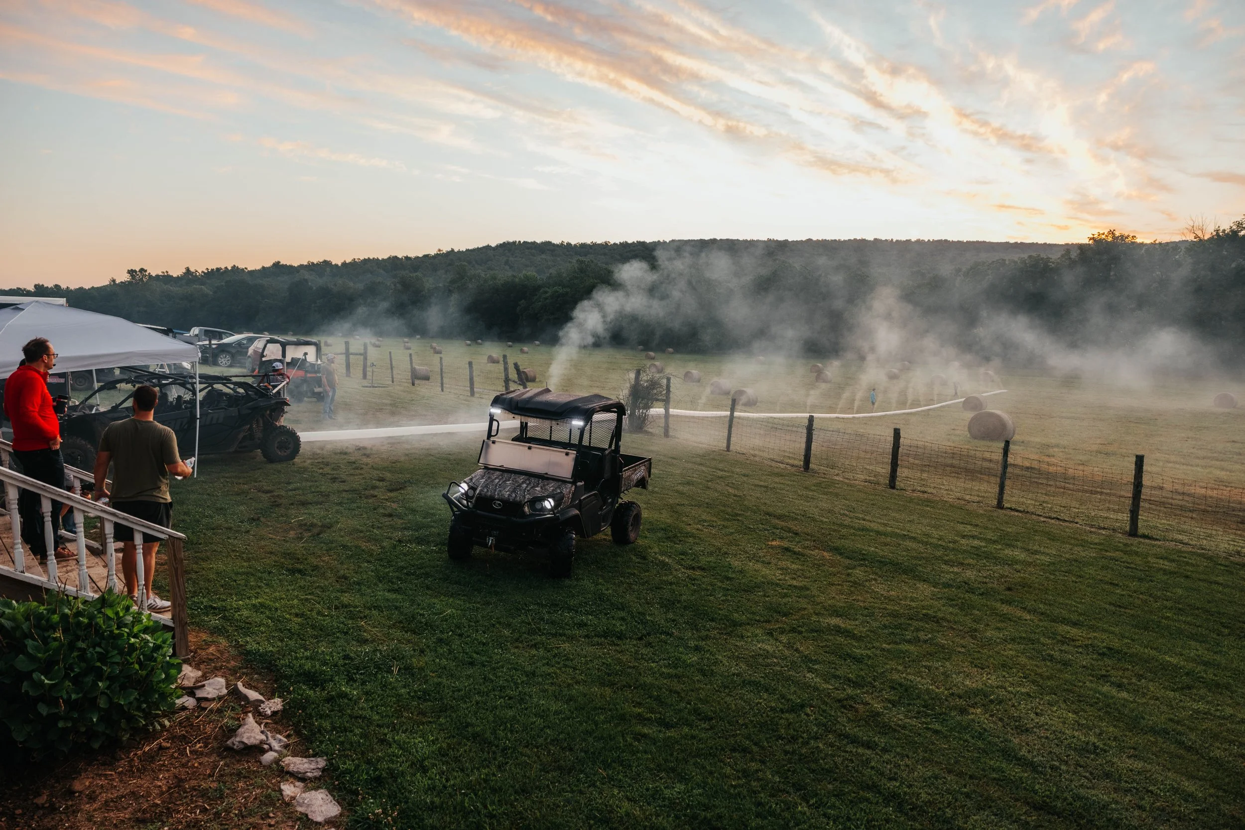 Behind the scenes of Kubota commercial video production on a ranch set at sunset