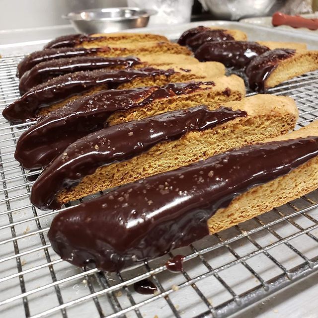 Time to make the biscotti! Almond and Orange Zest Biscotti dipped in Chocolate and dusted with Demerara sugar 🍊🍫☕️ available today! #StAnthonysFeast2018