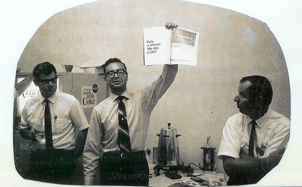"Future Intel CEO Andy Grove holds Intel 3101 ad in 1969." Photo by Intel Free Press , licensed under CC BY 2.0 .