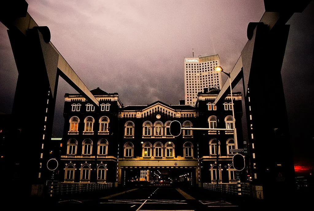 The Poortgebouw was built to be the headquarters of one of Pincoffs' companies. But after he fled, it fell into disuse. It later became a squat and a social space, a century later in the 1970s. Image courtesy of Roman Godorejckij, CC .