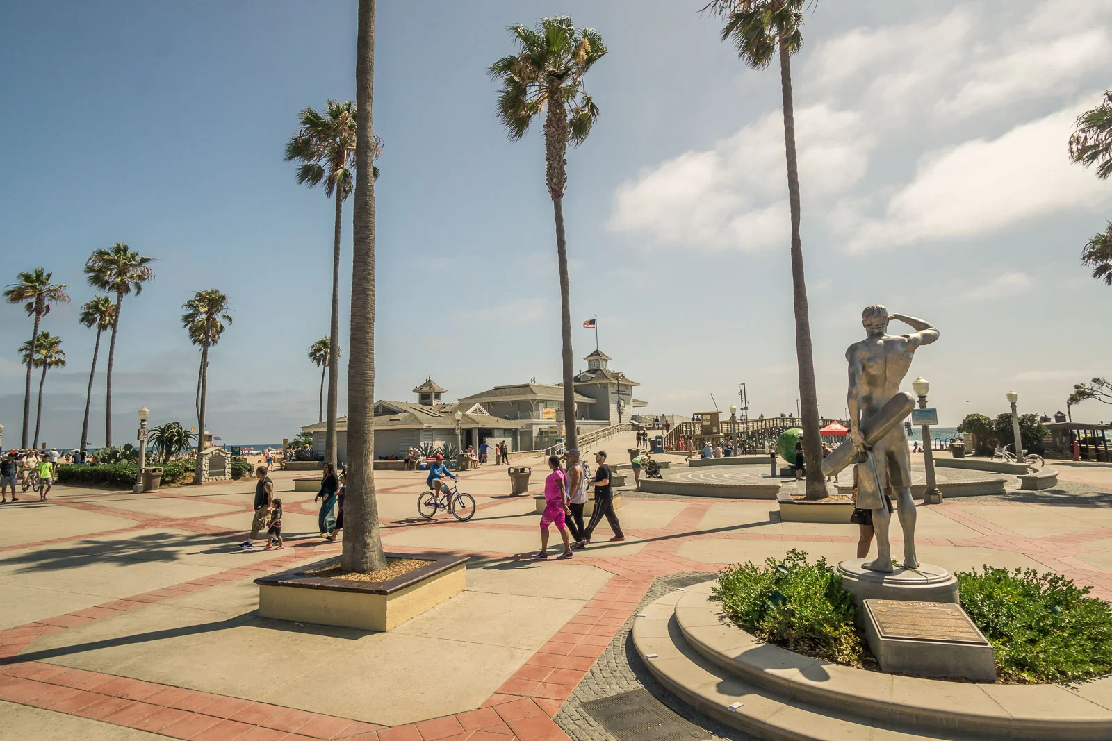 Newport Beach pier Plaza on a sunny afternoon ben lifeguard Monument