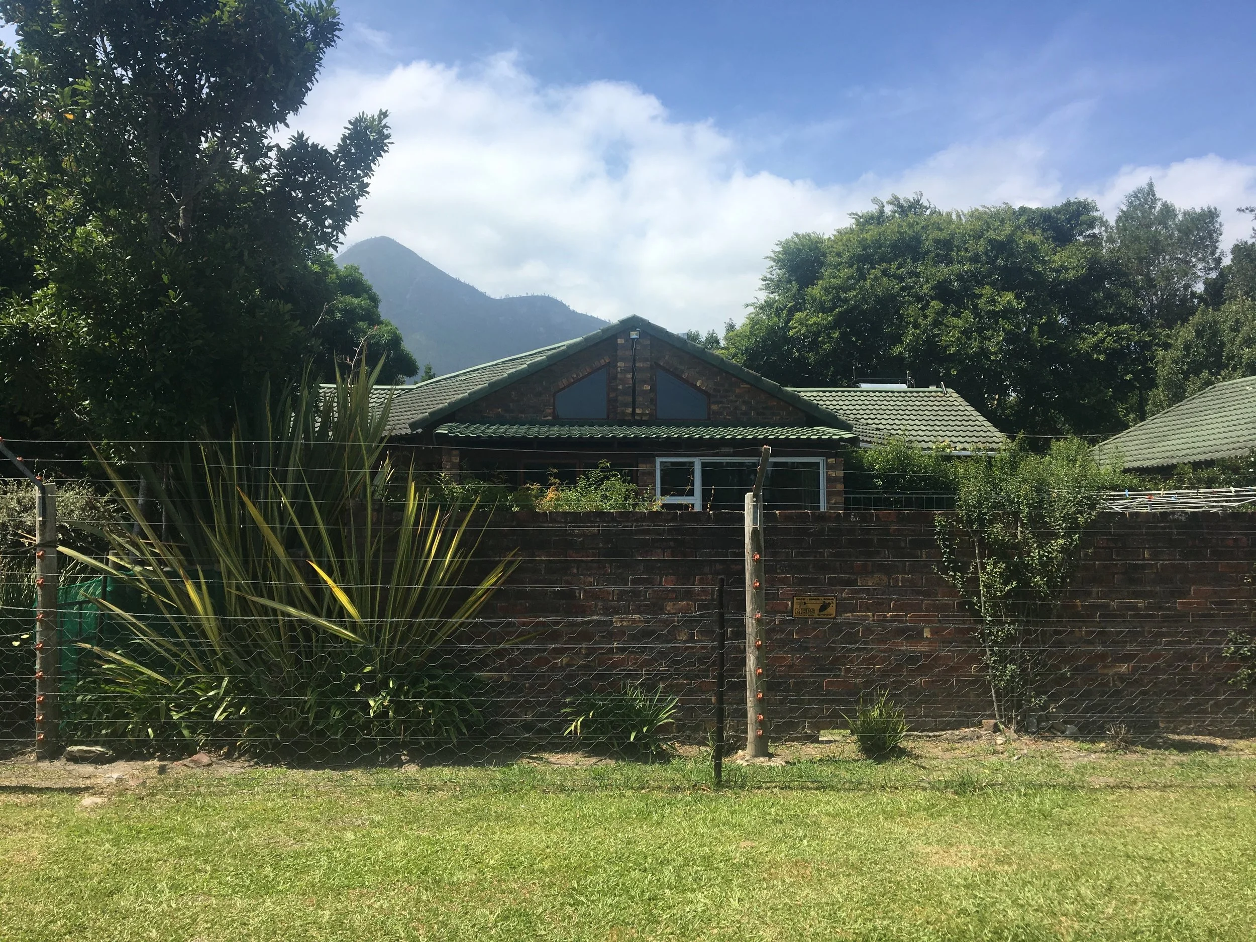 Our rental in Storms River in the Eastern Cape: hard to see the lovely home behind the wall and wire fence