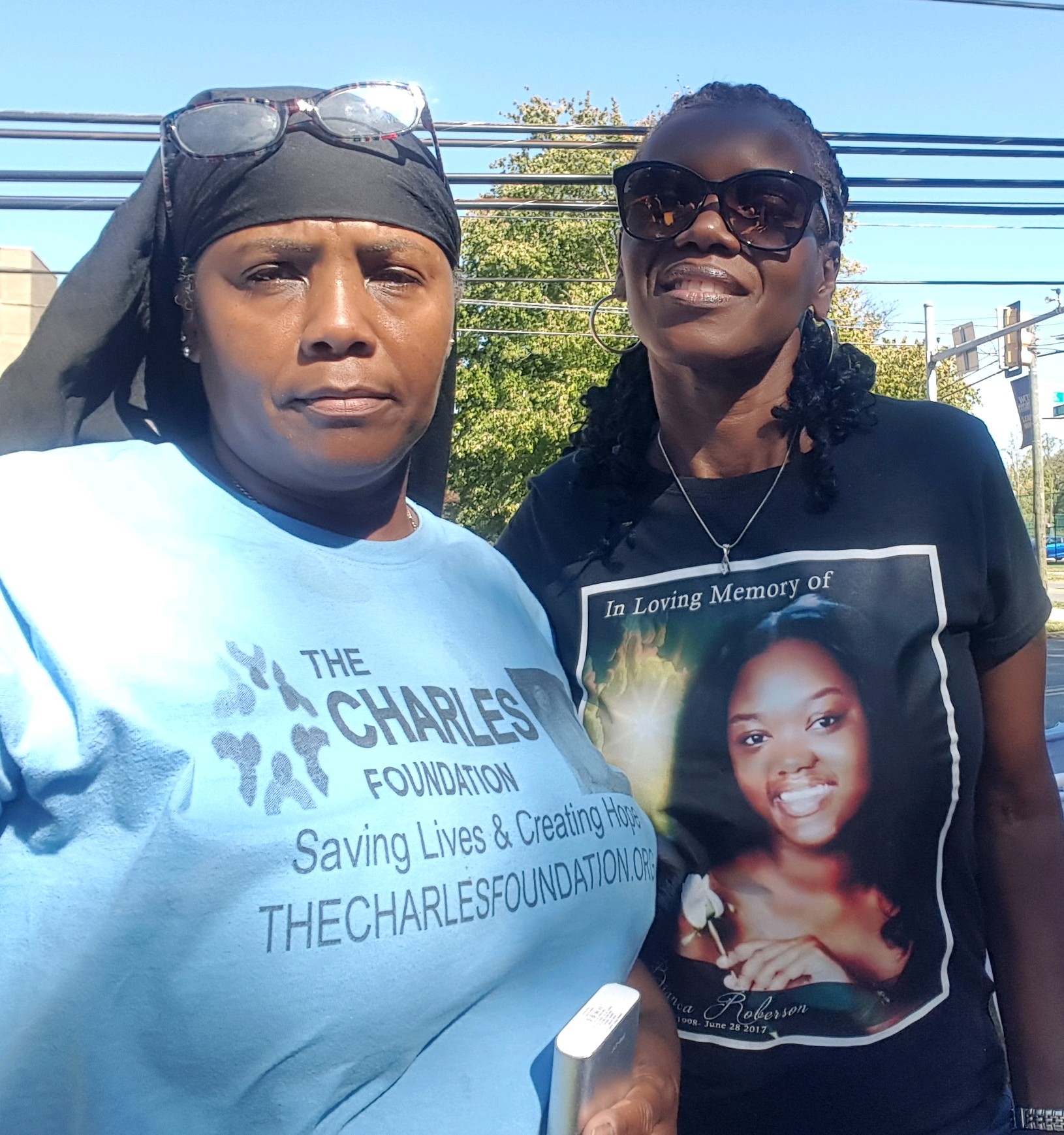 The CHARLES Foundation's Movita Johnson-Harrell with Bianca Roberson's mother. 