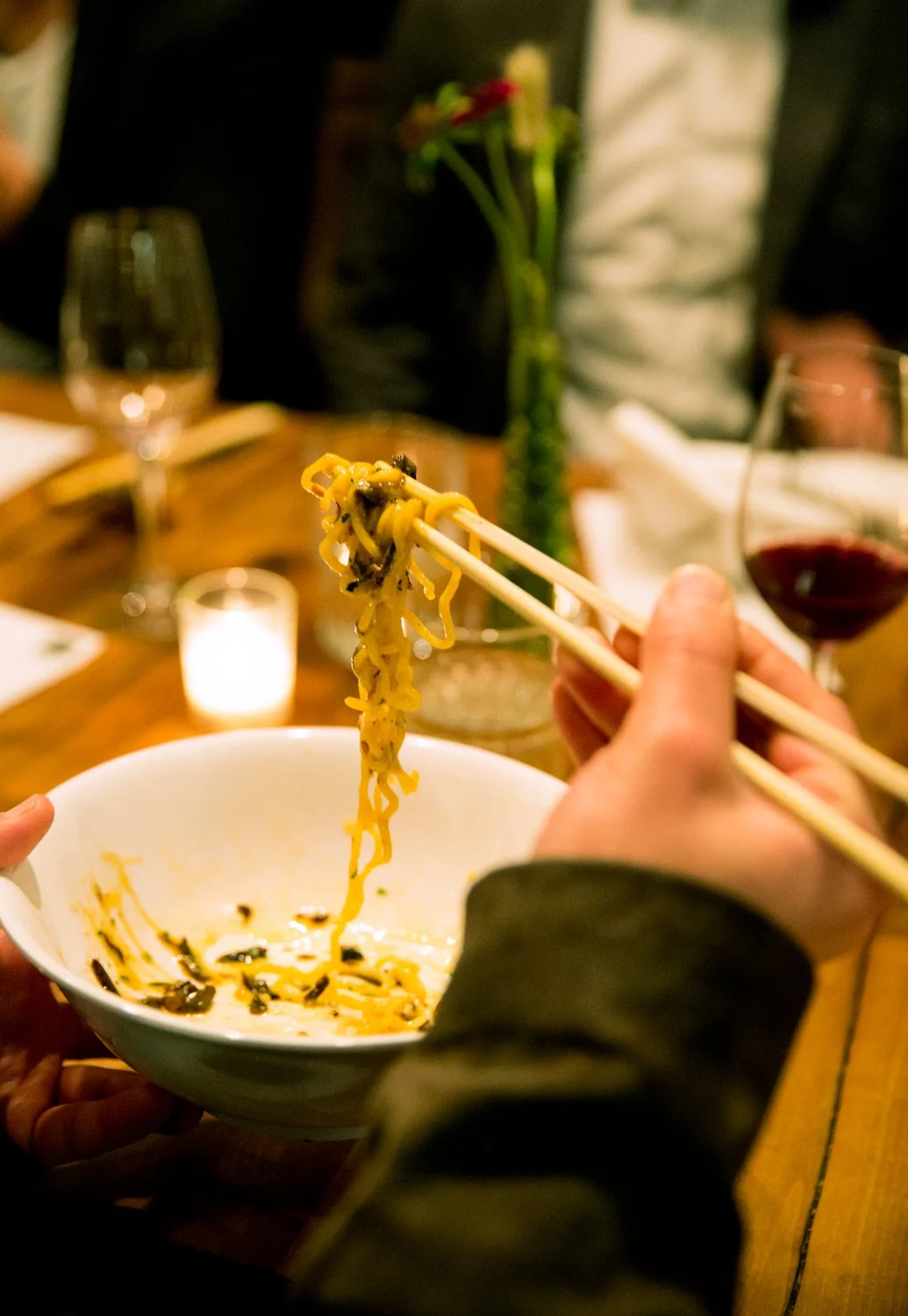 hand-with-chopsticks-holding-ramen-noodles-angela-decenz-20151109_MG_4252.jpg