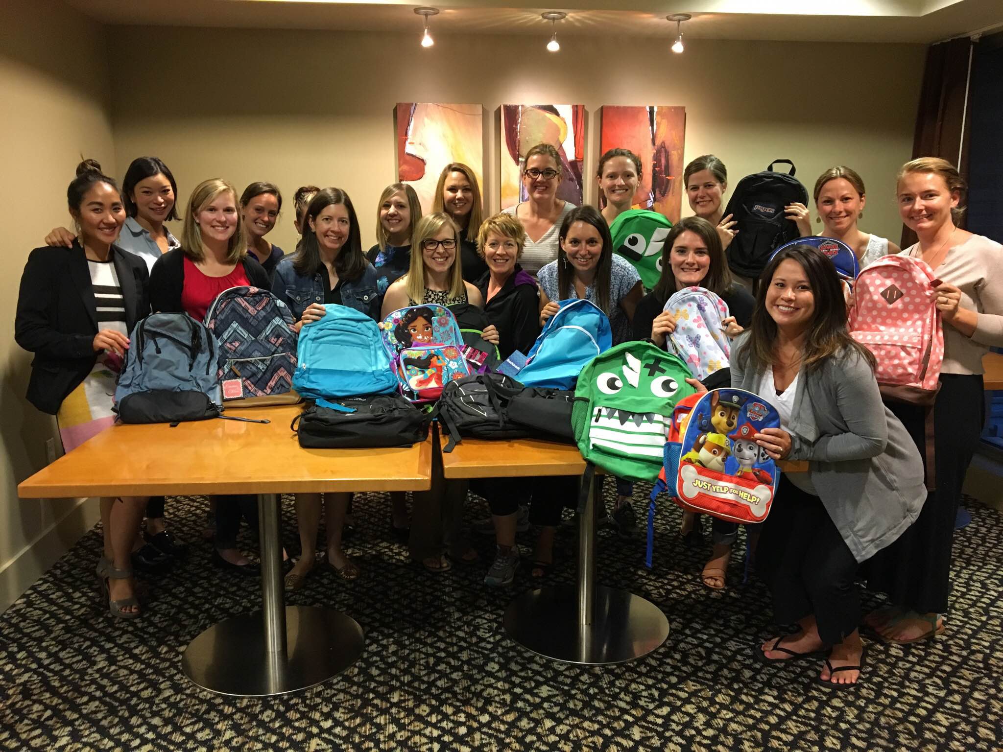 WPIG members collected 36 backpacks and 2 bags of schools supplies for Mary's Place Back-to-School supply drive. (2016)