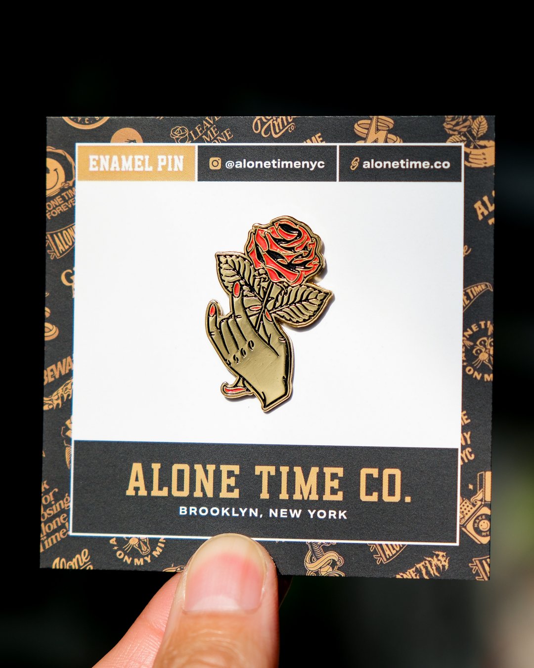 Alone-Time-Pin-Rose-Hand.jpg