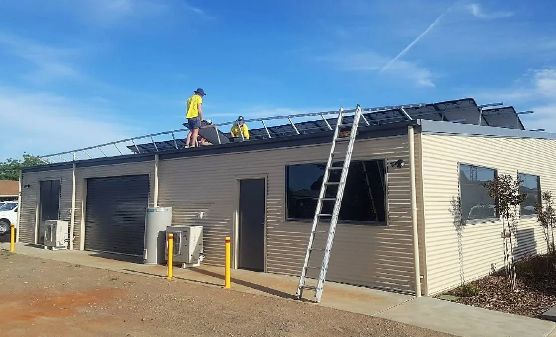 Solar panels being installed on the BCG office; the remainder of the project - including batteries and SwitchDin energy management system - will be completed next year.