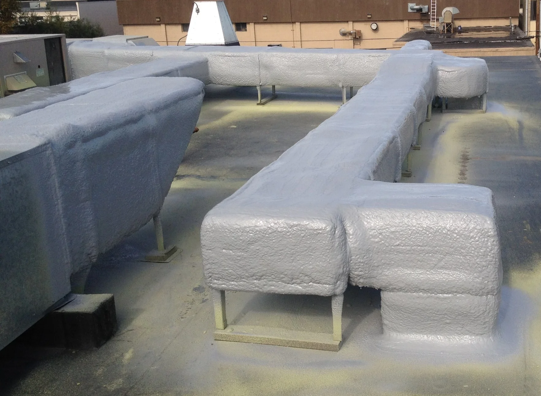 Urethane Alaska’s quality of rooftop ductwork after applying urethane and Polyshield.