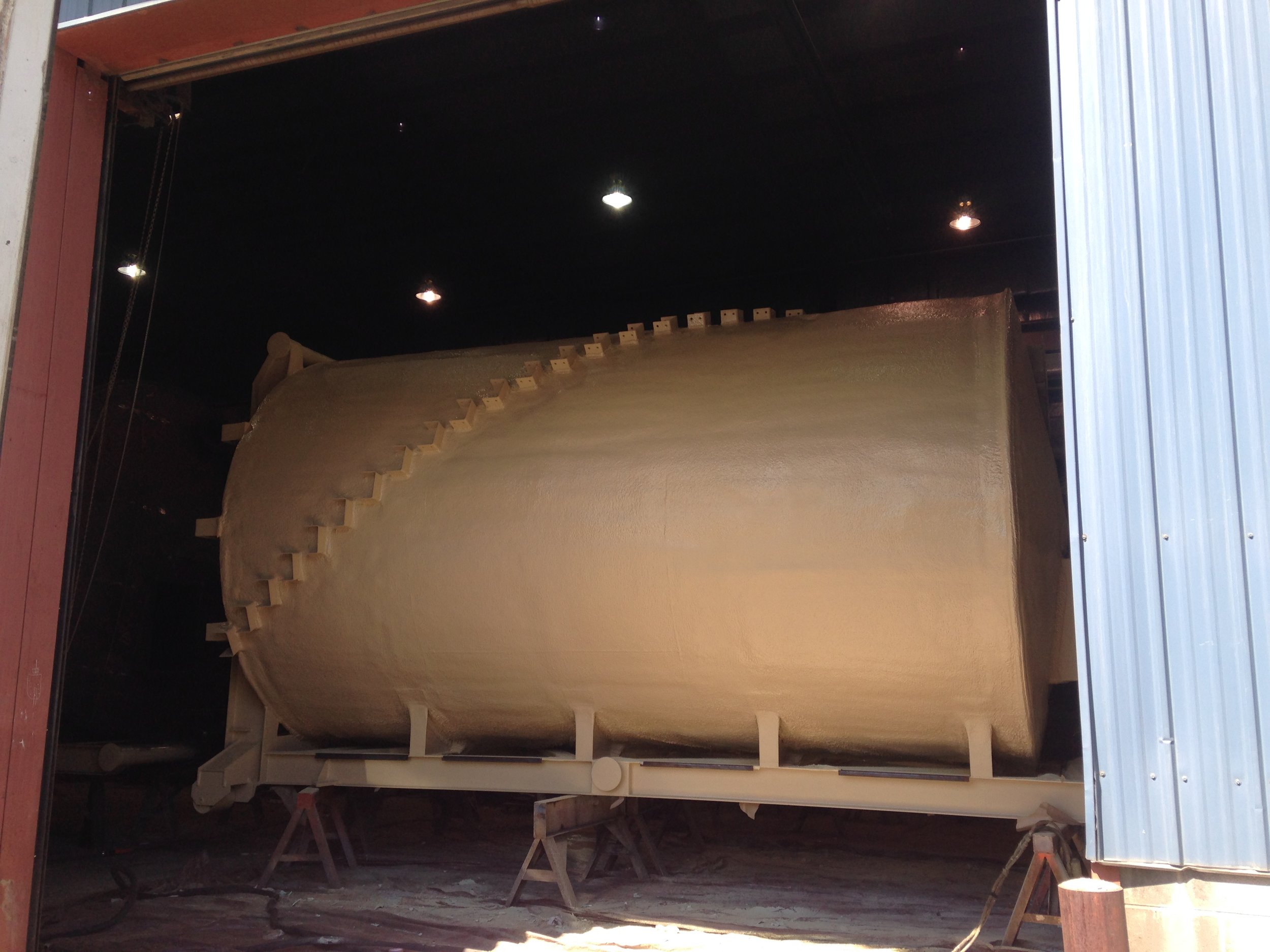  25,000 gallon fuel tank application with polyshield application following the urethane coating. 