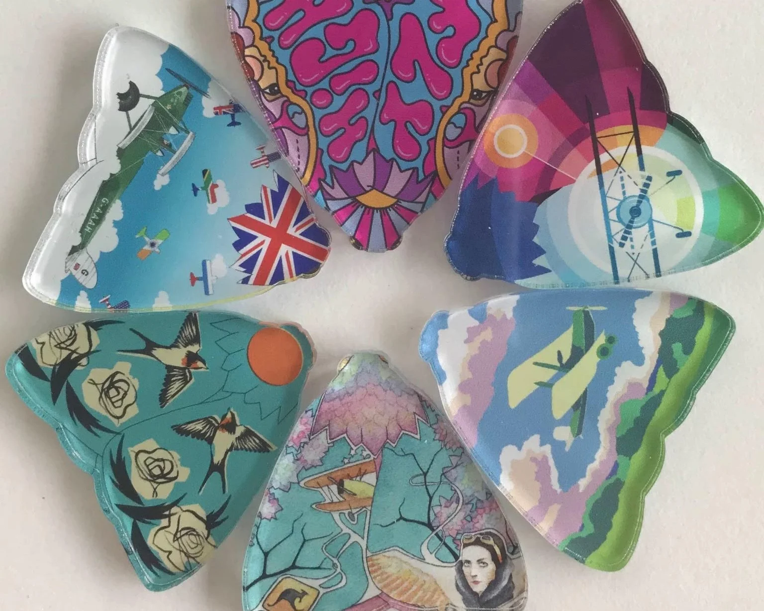 laser cut and laser printed mini-moth pinbadges - ajf