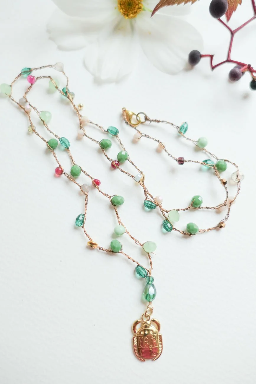 Scarab Glass Bead Necklace by Nikkotakko