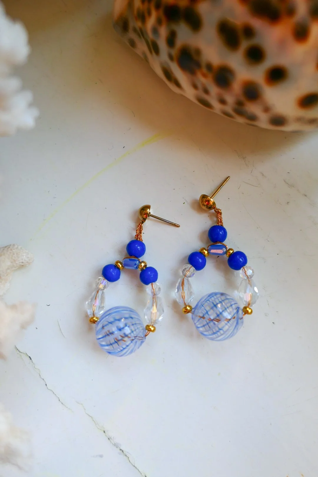 Transparent lines on Sea - glass bead earrings