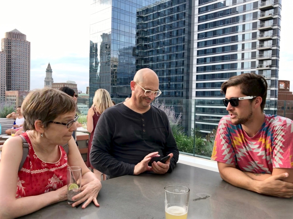 Angela, Dave, and Mat on the posh rooftop lounge of Yotel, Boston.