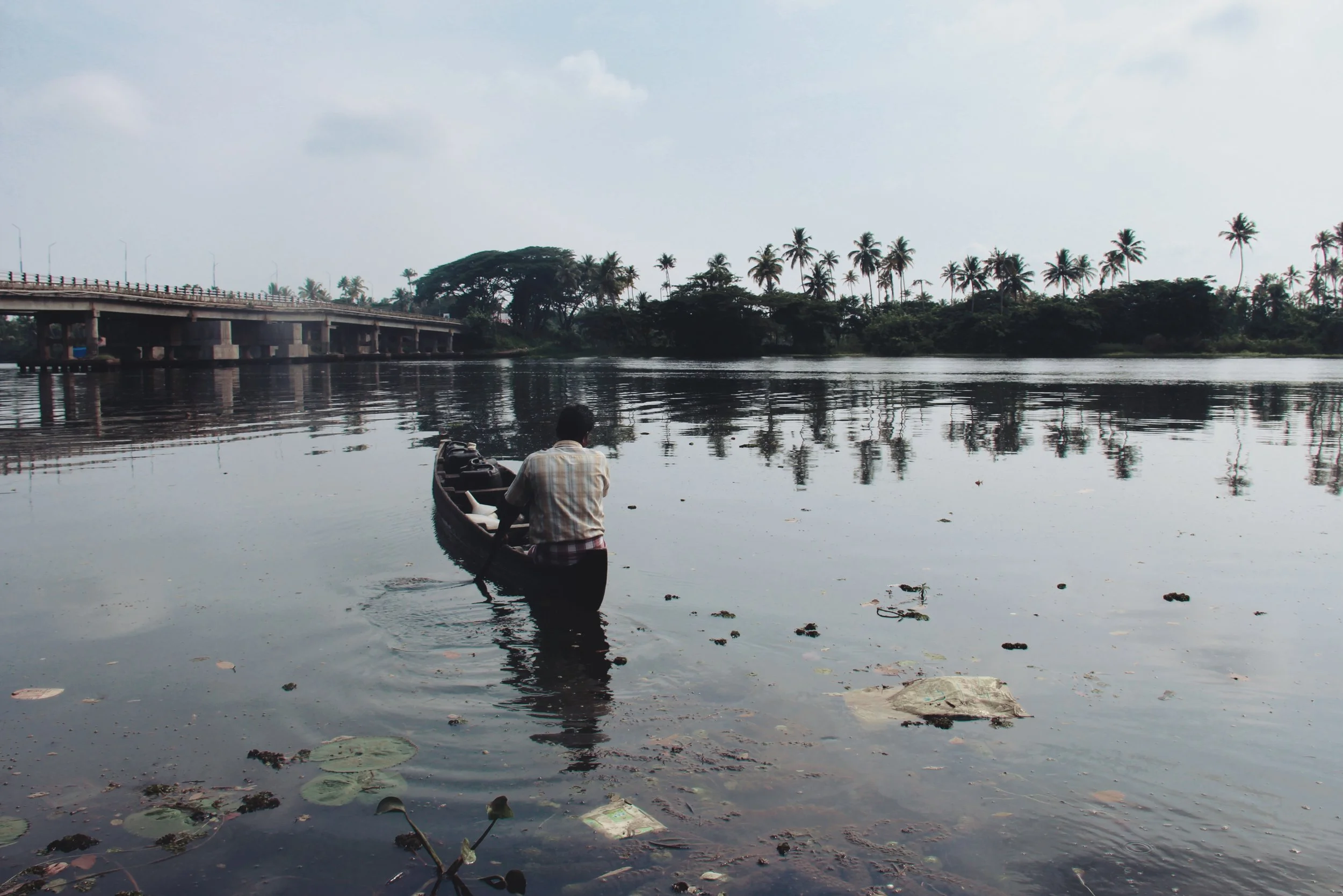 Signs of pollution across the backwaters of Alappuzha, Kerala.