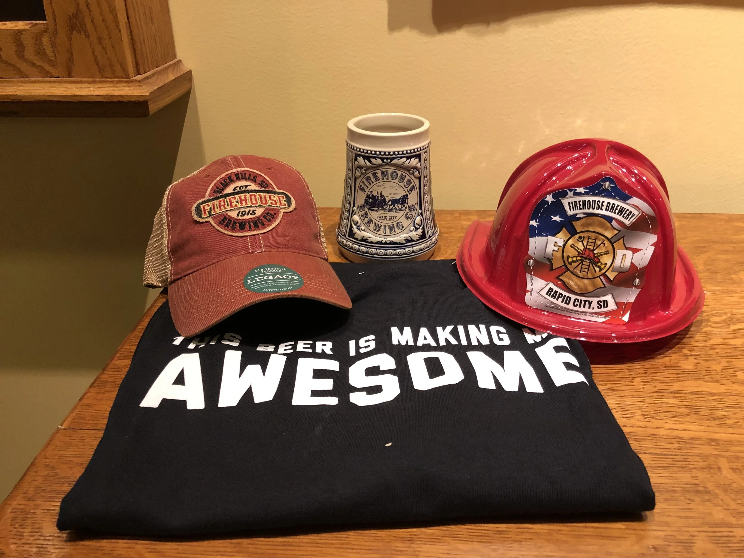 “This Beer is Making Me Awesome” XL t-shirt, Firehouse Brewery cap and tankard and Firehouse Brewery kids firemen hat from Rapid City, South Dakota
