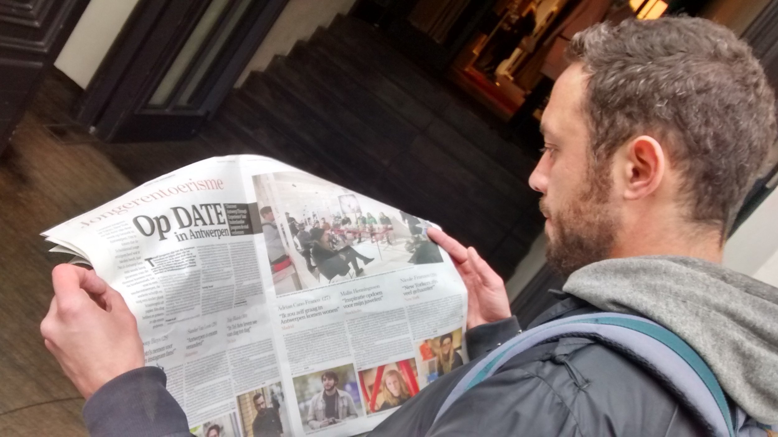 Me looking for myself in the local media coverage - Photo credit This is Antwerp