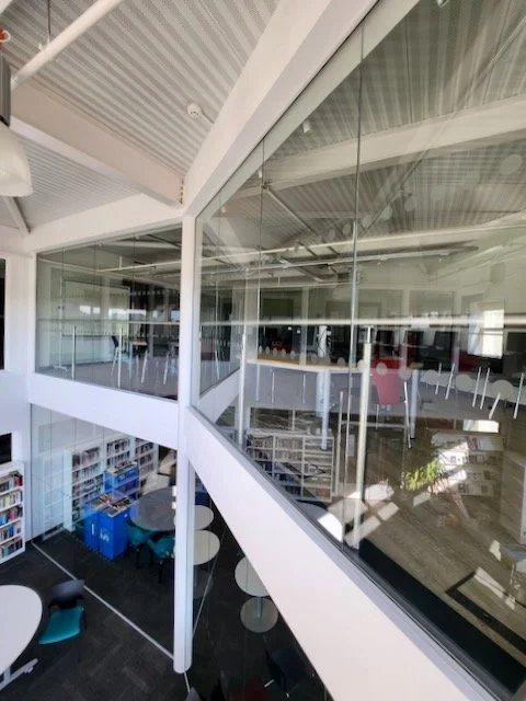 Glass partition to library
