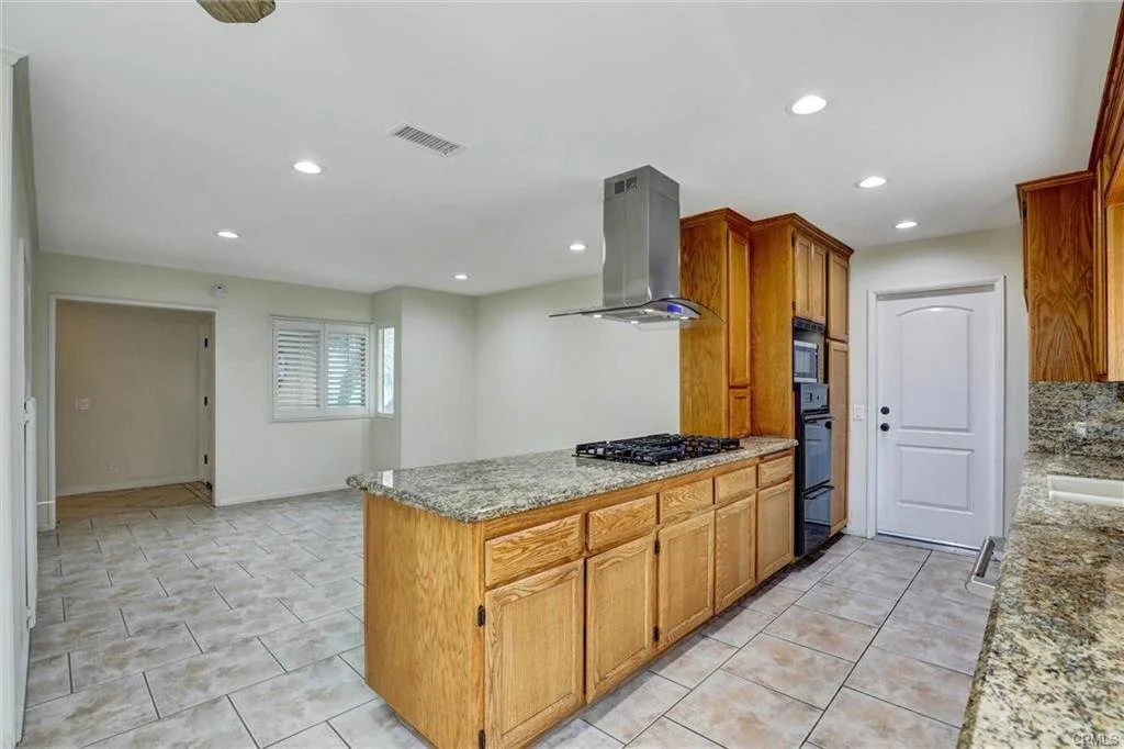 Functional living room and kitchen layout in older home