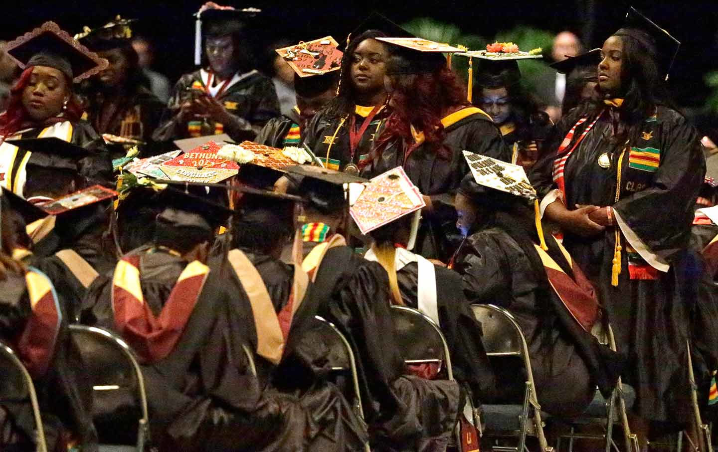 Students at Bethune-Cookman turning their backs to Betsy Devos. photo via the nation.com