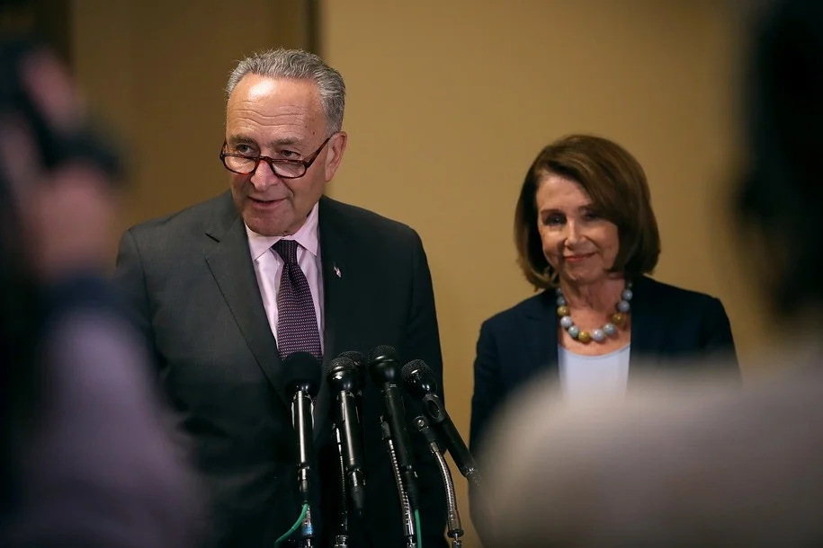 Schumer and Pelosi, photo via DailyKos
