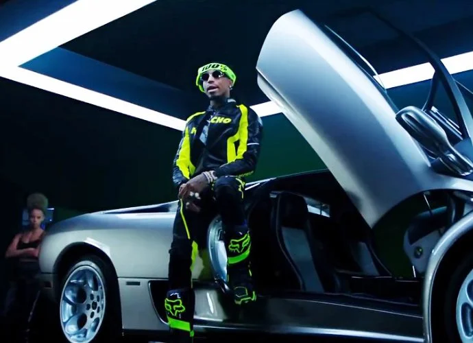 "Motorsport" video, photo via YouTube