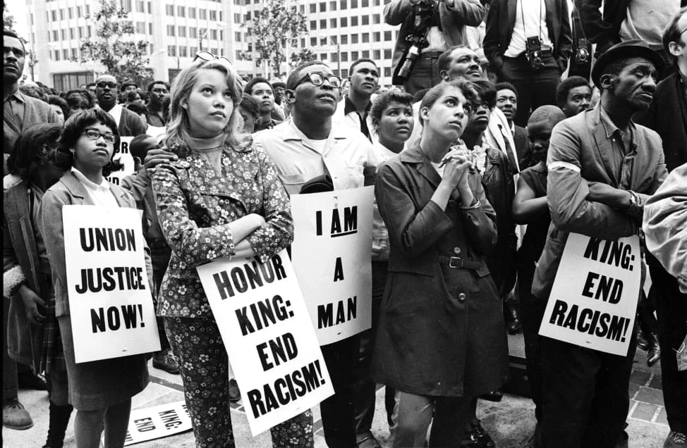 protestors honoring King, photo via Getty Images