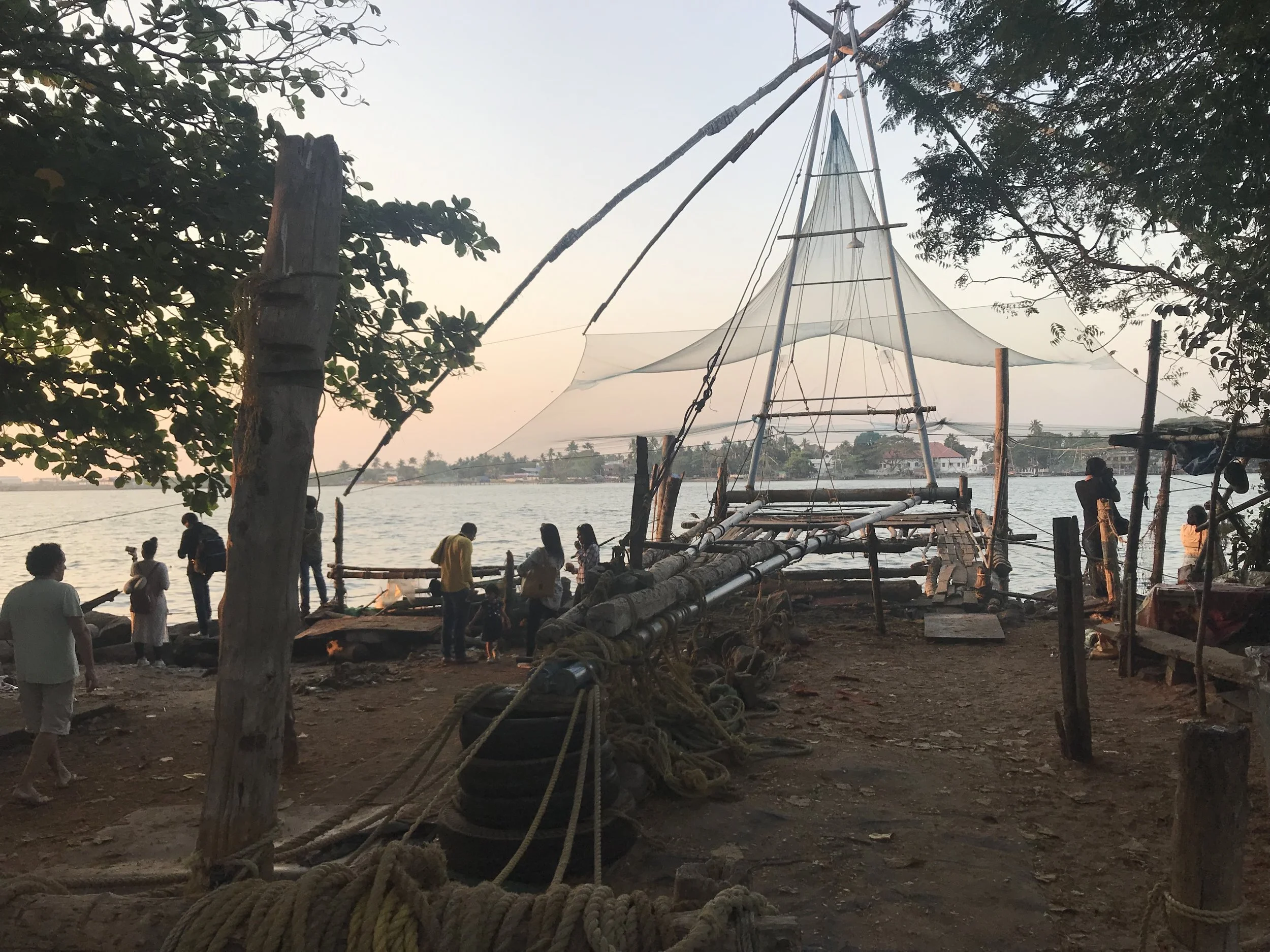 One of the Chinese fishing nets from the back. The net is perfectly balanced, so that a person walks along the length of the beam to dip the net into the water, and then after a bit, a team of fishermen use ropes to bring in the catch.