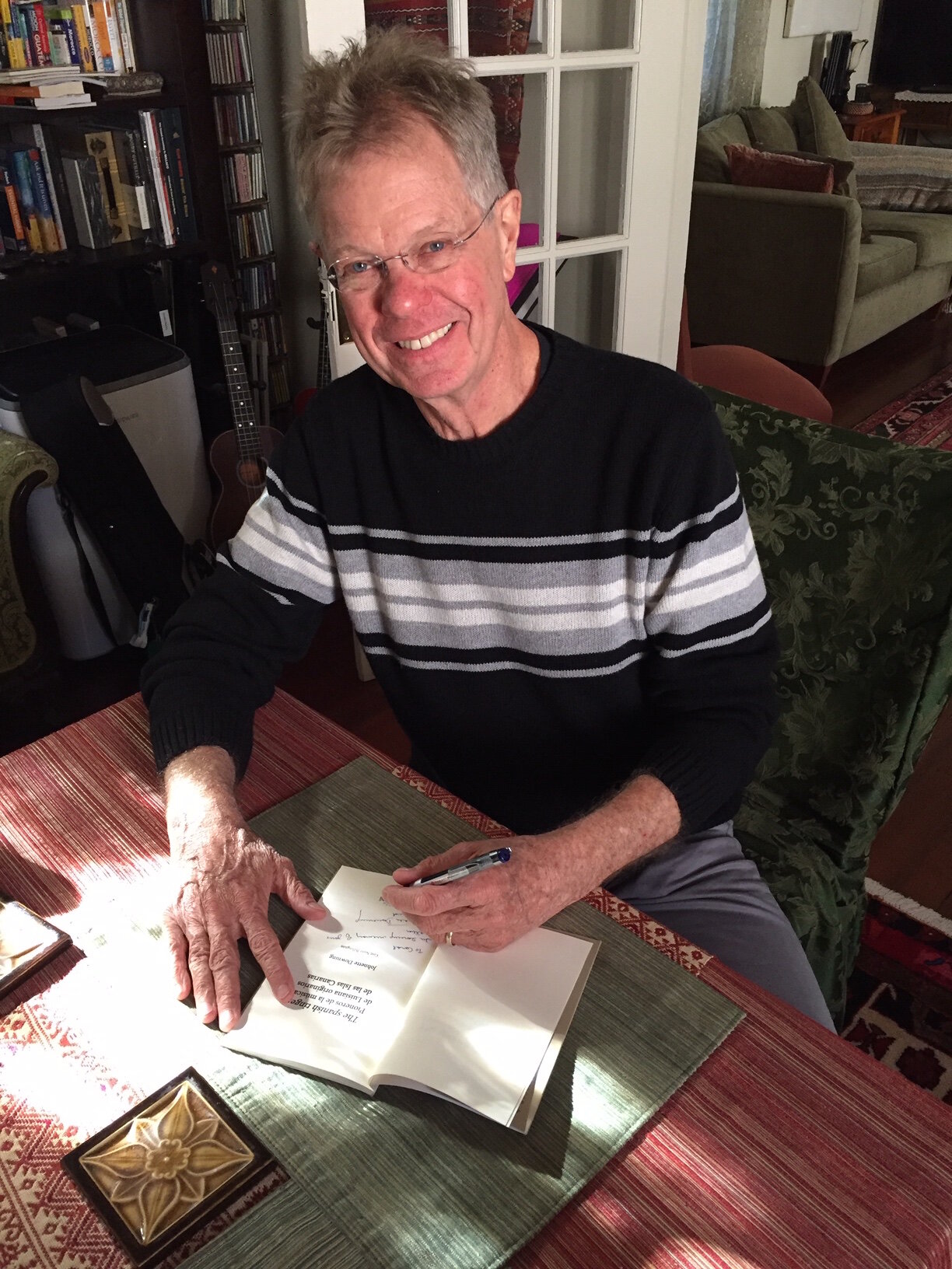 Scott signing first book.jpeg