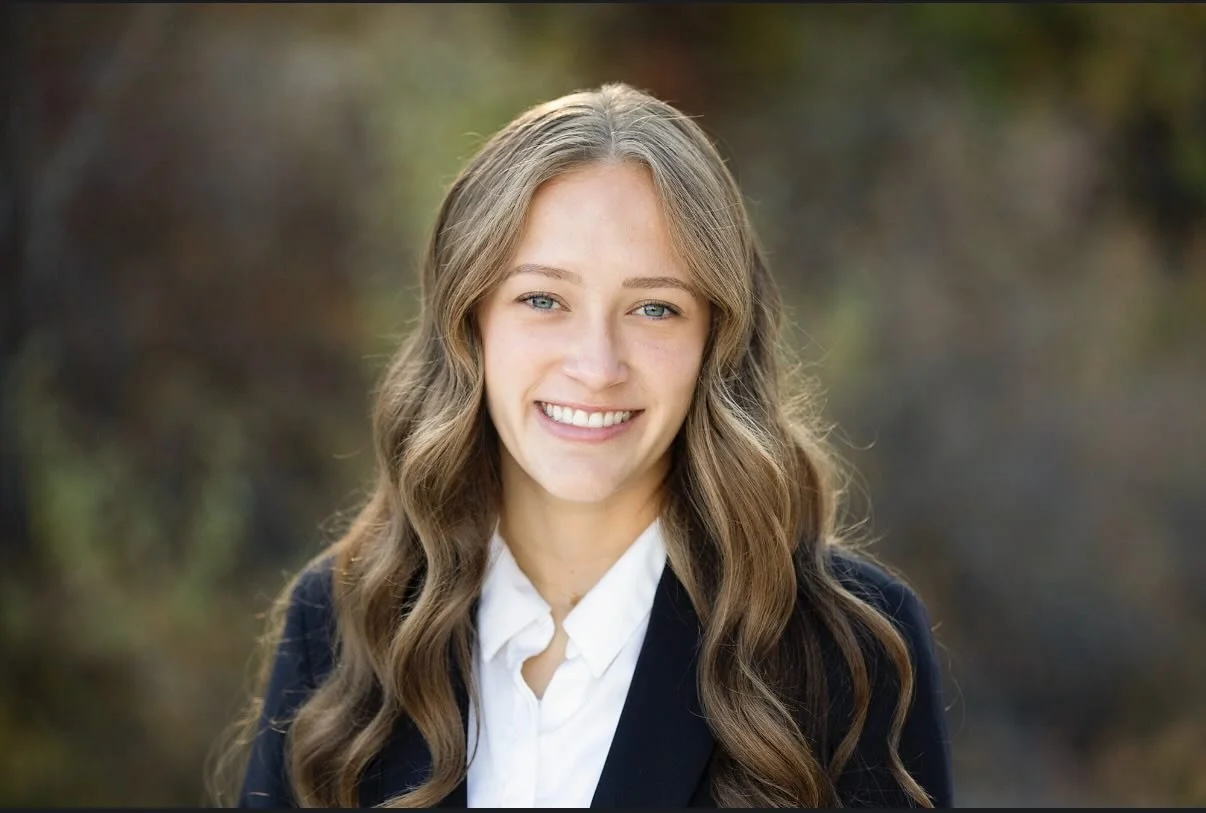 Bella needed a new photo for her new job and they specifically requested an outdoor headshot for their website. As I typically shoot inside the studio, we literally stepped out onto the roof and used the fall scenery from the nature trail right behin