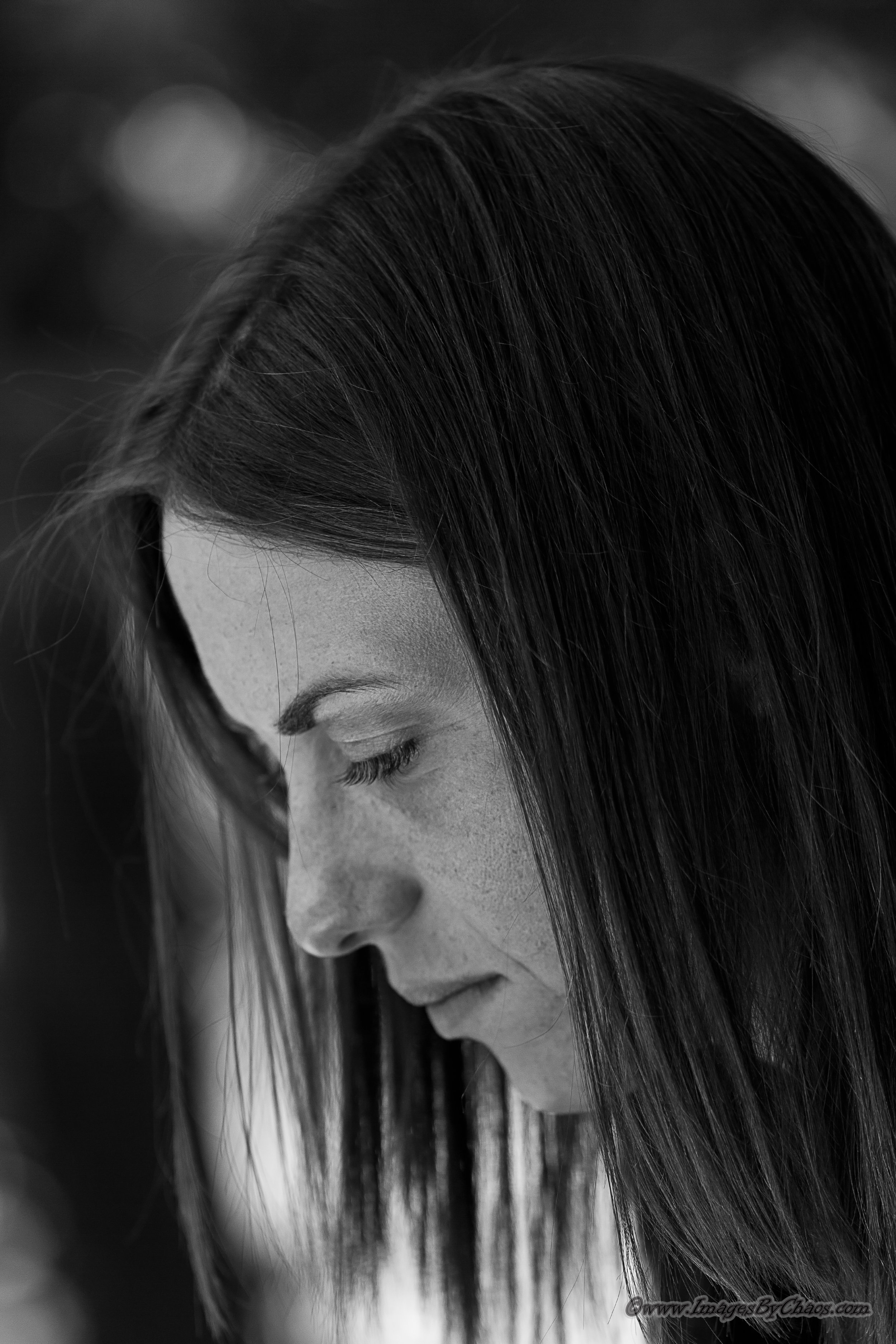 A beautiful young woman in a thoughtful state.