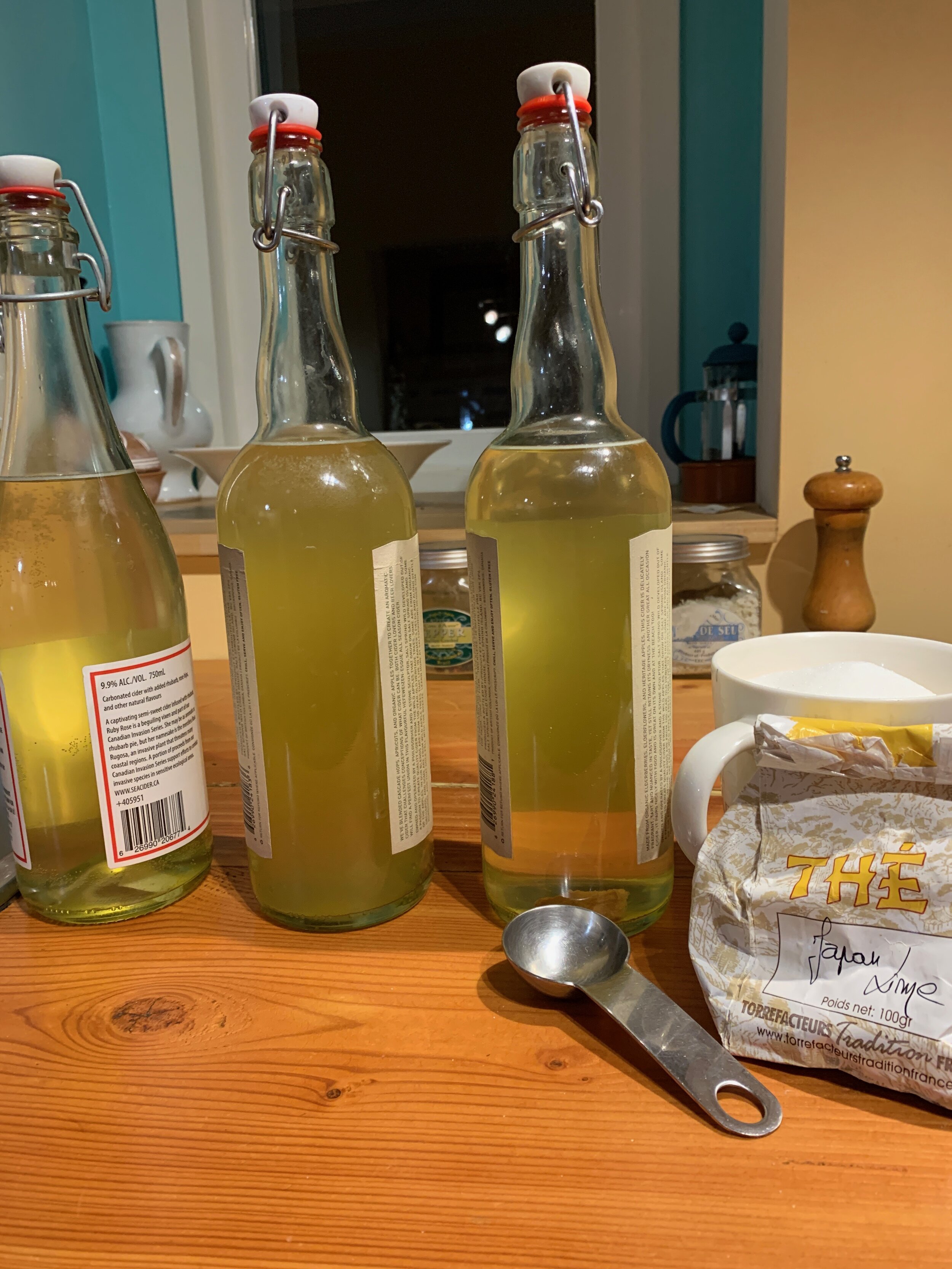 Glass bottle filled up with Kombucha