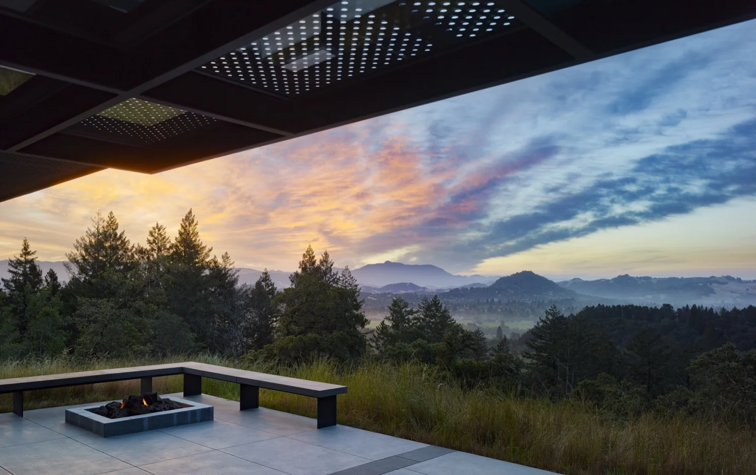 The edge of the firepit was calculated to be a comfortable distance for warming your feet while sitting on the bench.