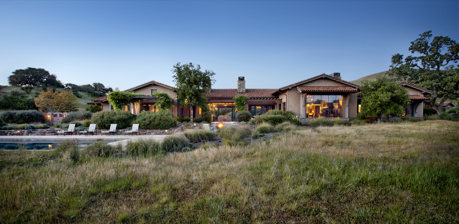 An overview of the expansive home and pool area.