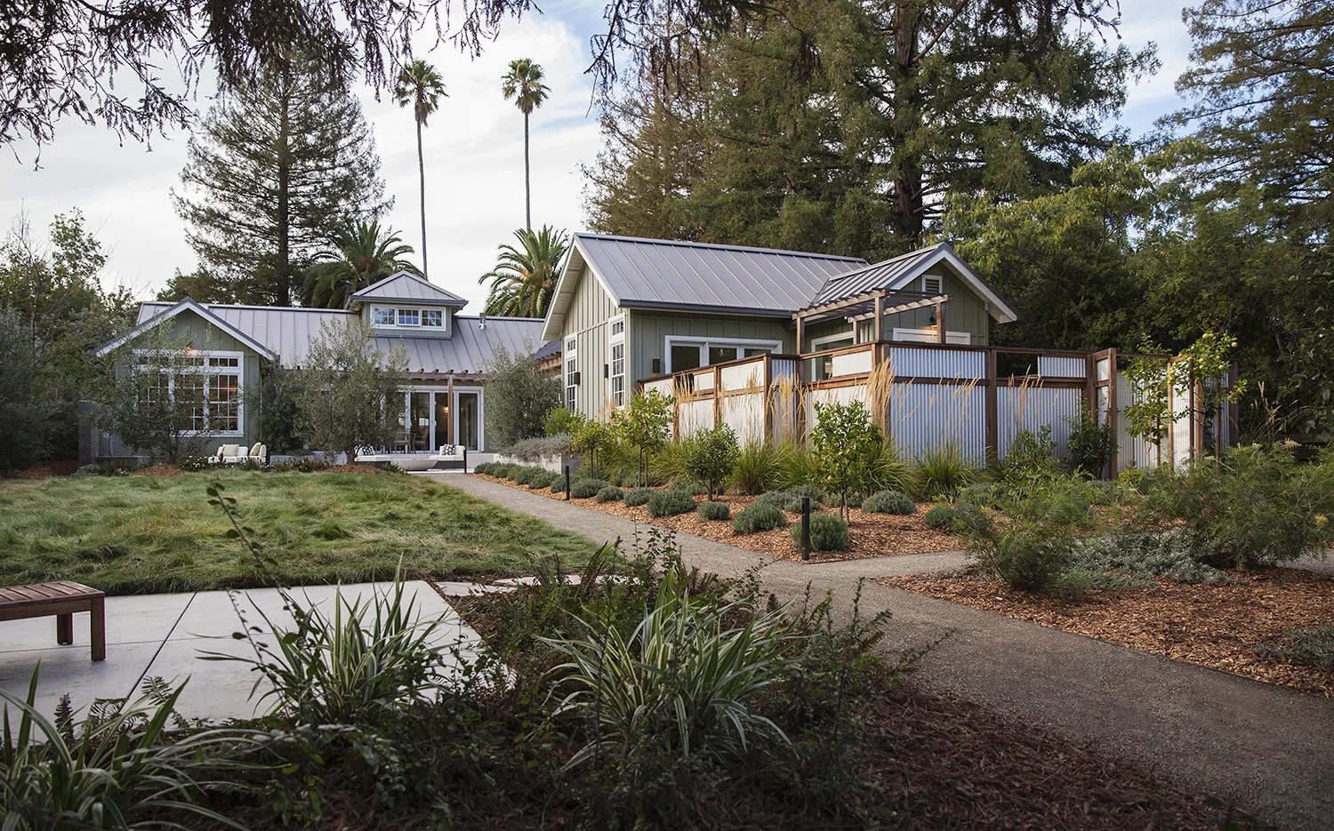 The no-mow lawn provides play space to the left, and the enclosed patio off the master bedroom provides privacy to the right.