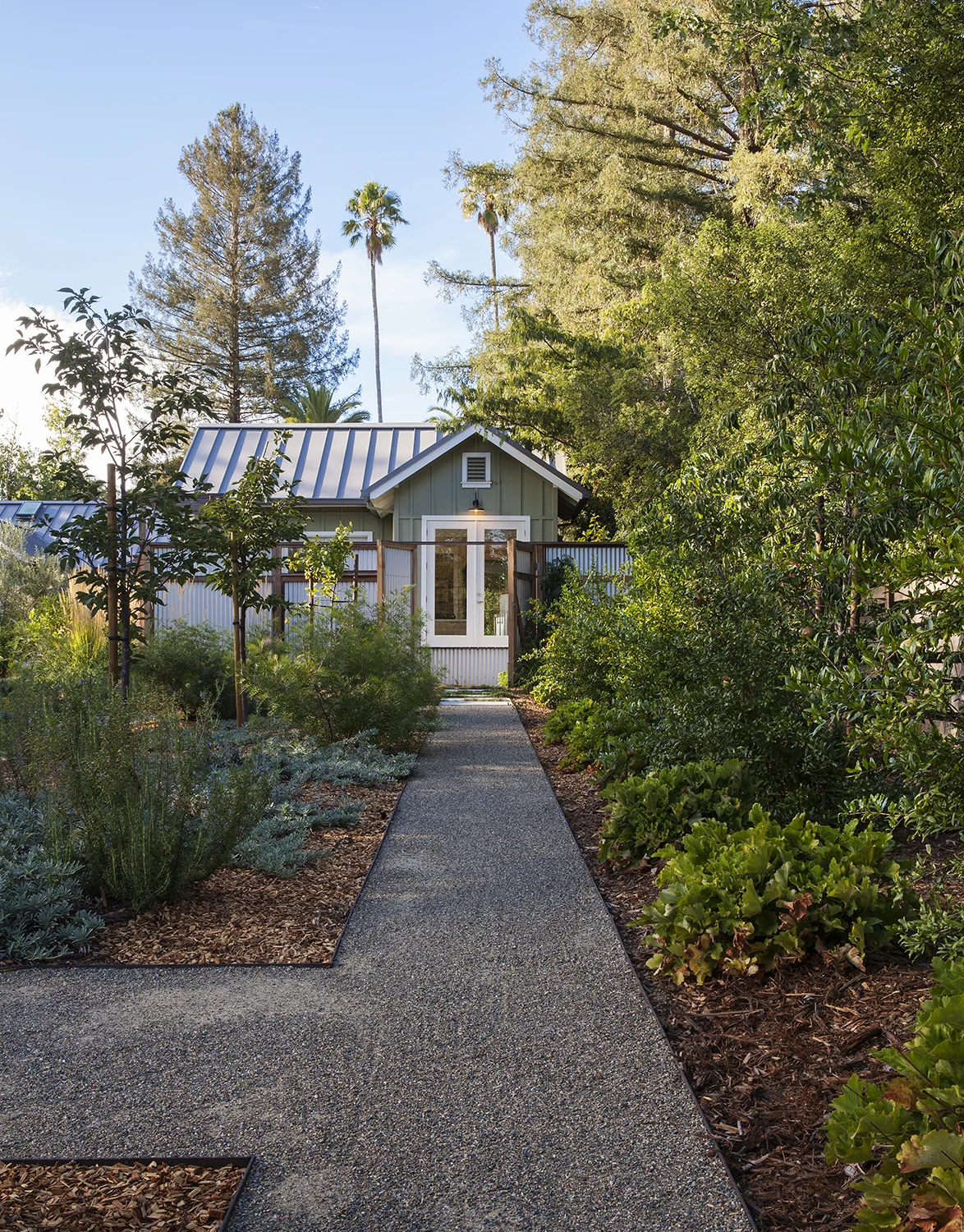 The gravel path is pleasantly crunchy to walk on, and leads up to the master bedroom patio.